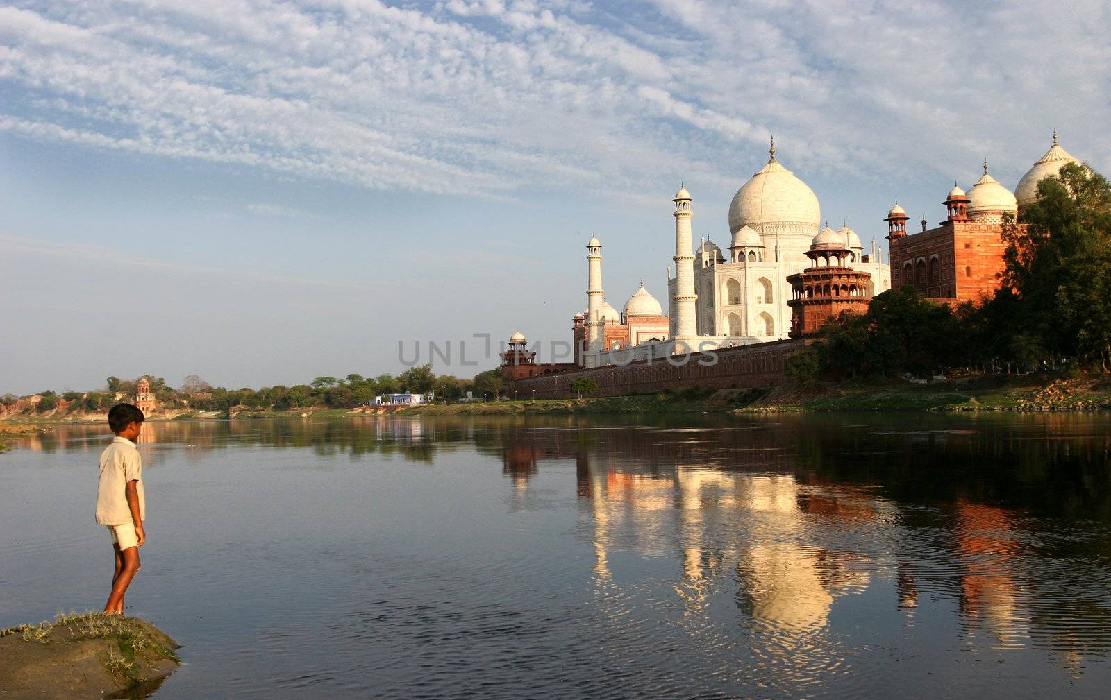 Taj Mahal mirrored in a river