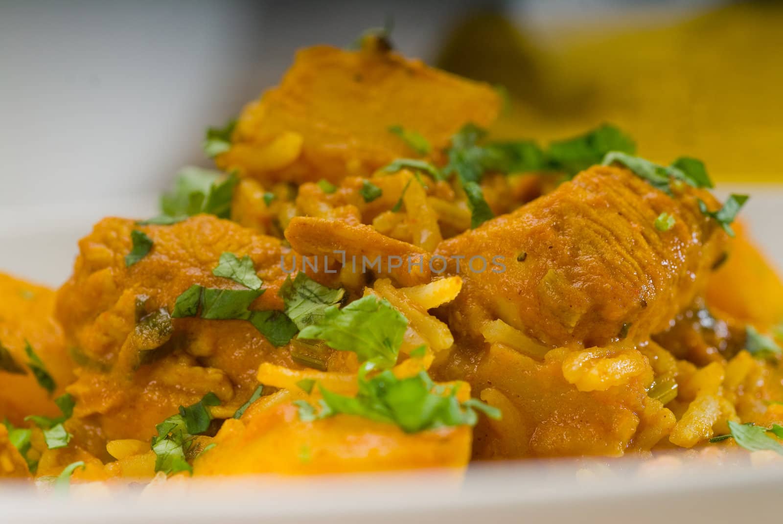 fresh home made curry beef rice and potatoes with ingredients around composition