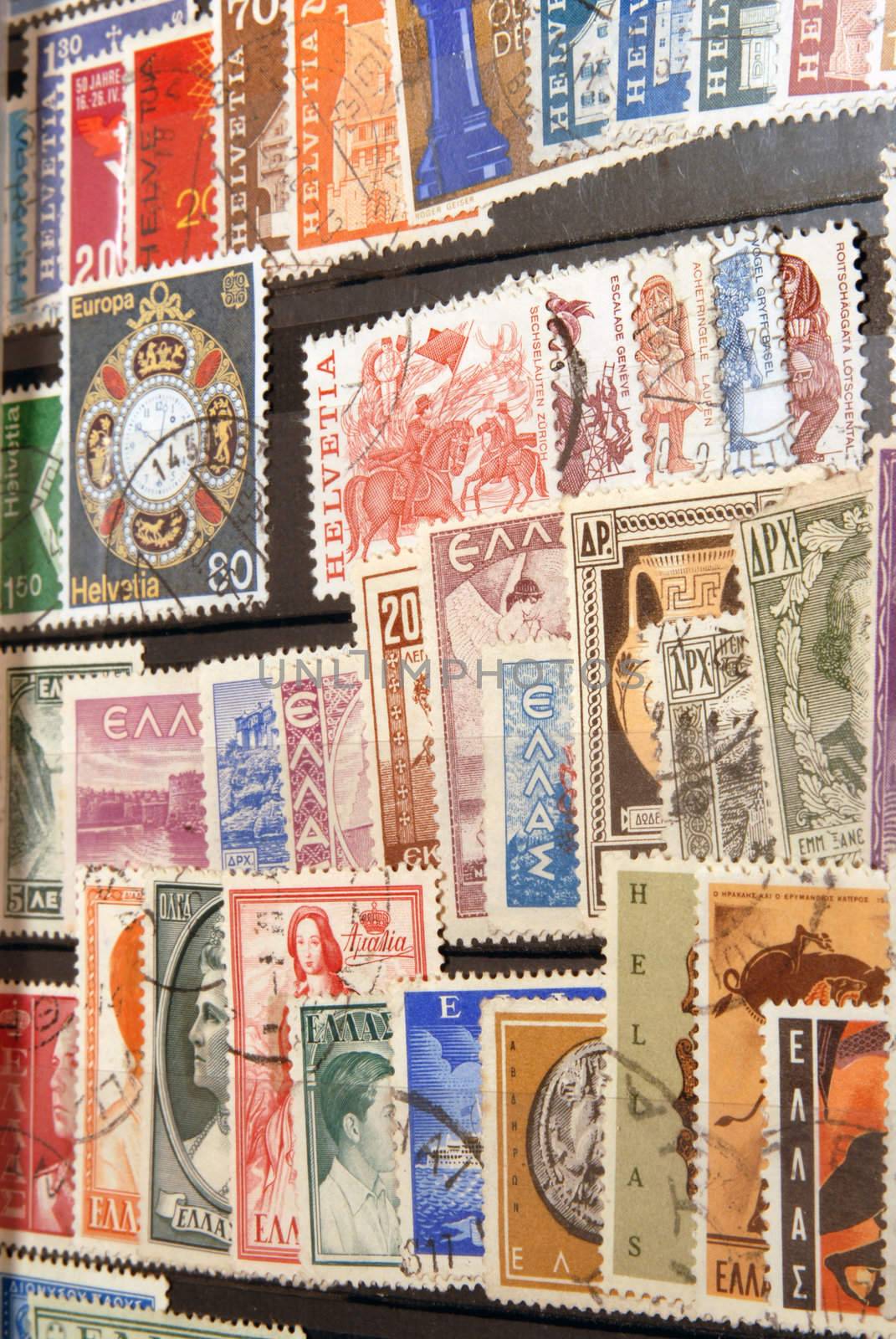 Diverse and colorful vintage postage stamps from Helvetia. Old collection.
