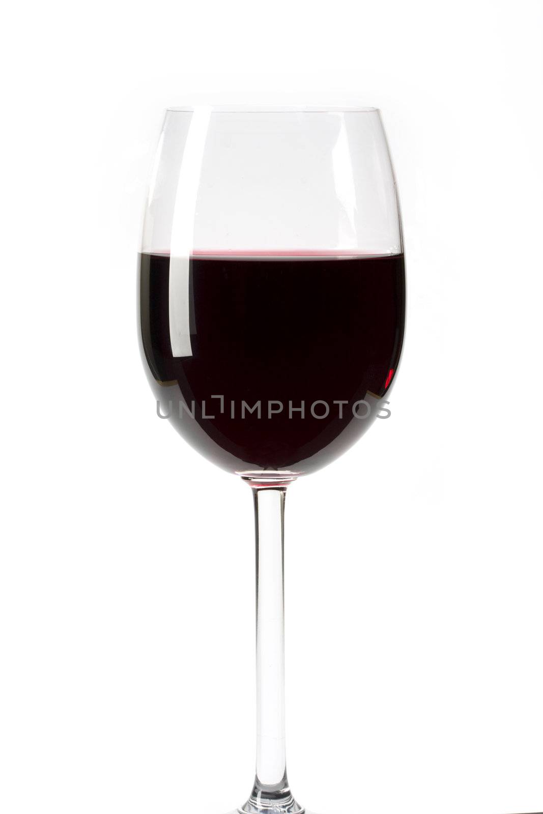 a glass of red wine by bernjuer