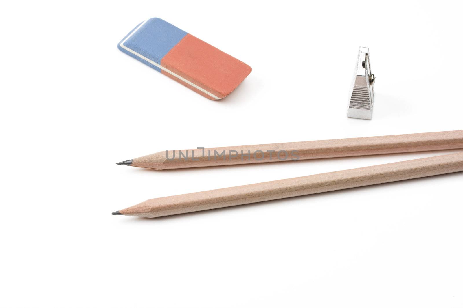 a pen, a sharpener and an eraser by bernjuer