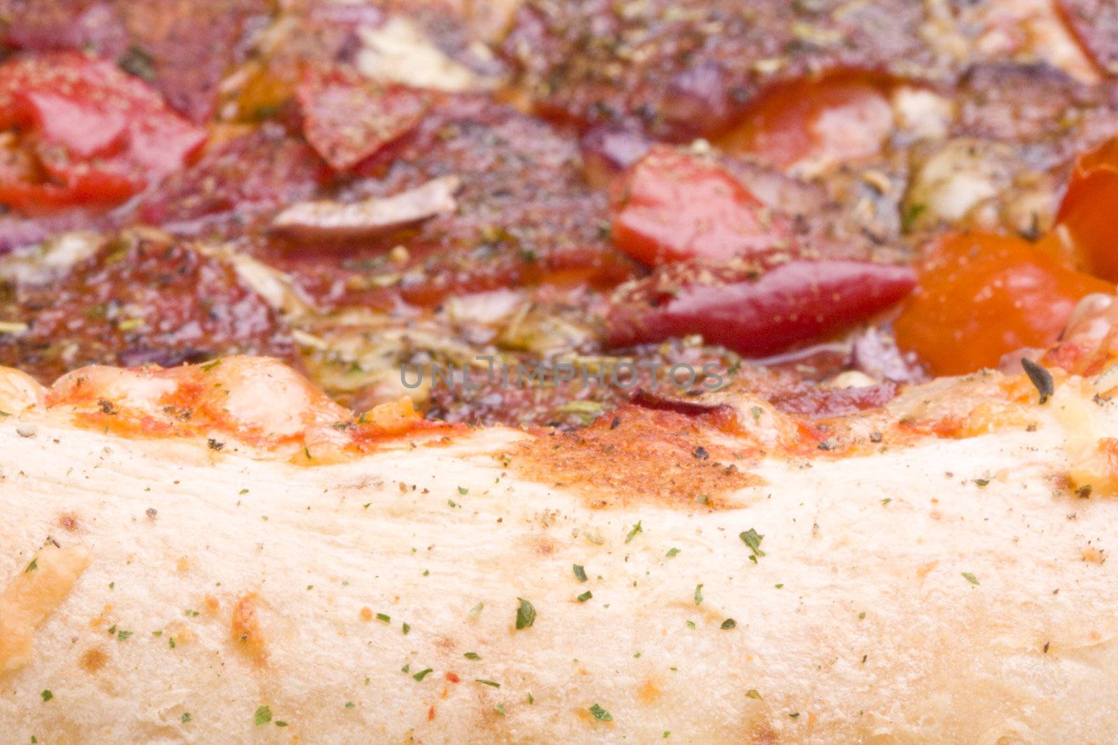 detail of a pizza by bernjuer