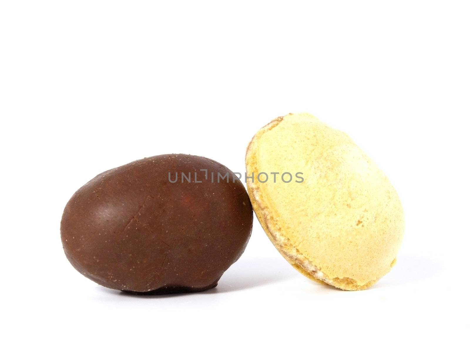 chocolate eggs and wafel eggs isolated on white background