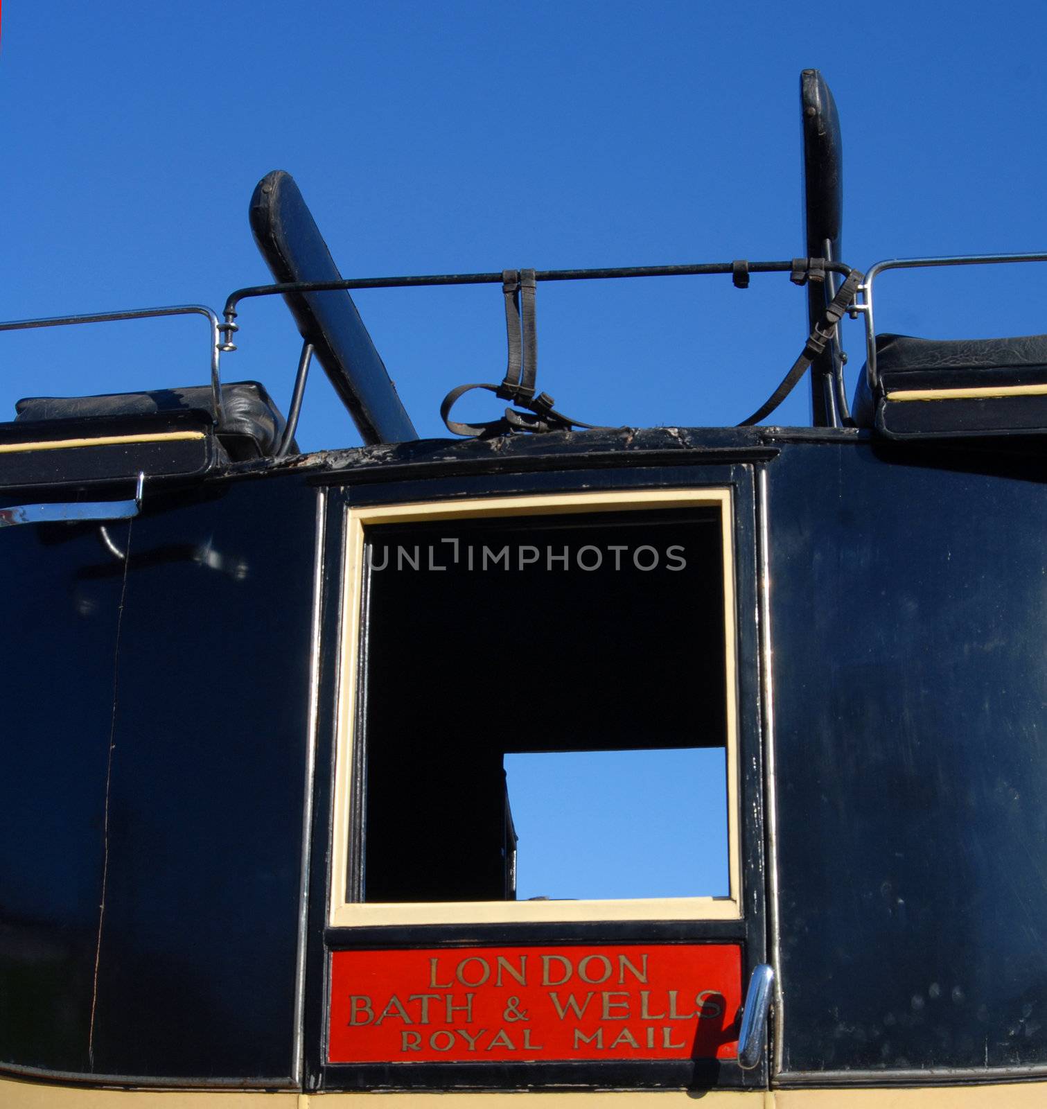 Ancient chariot detail with a blue sky in the background