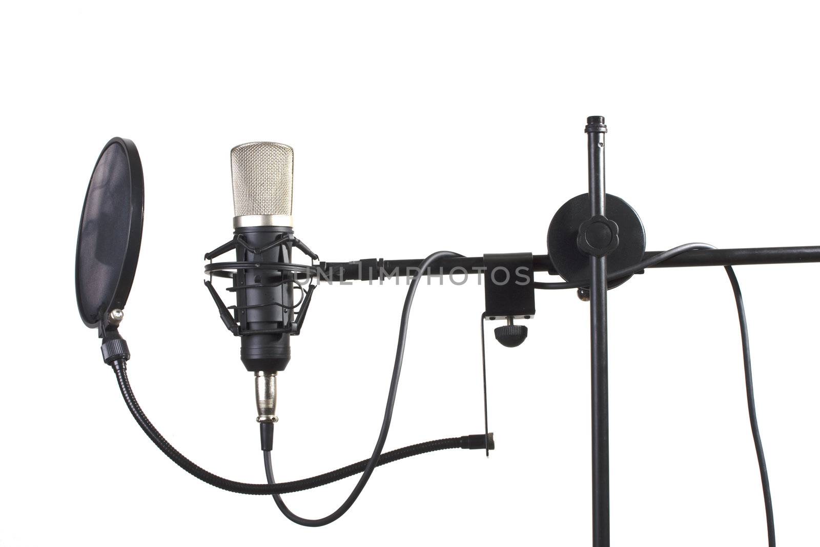 studio microphone on a stand on white background by bernjuer