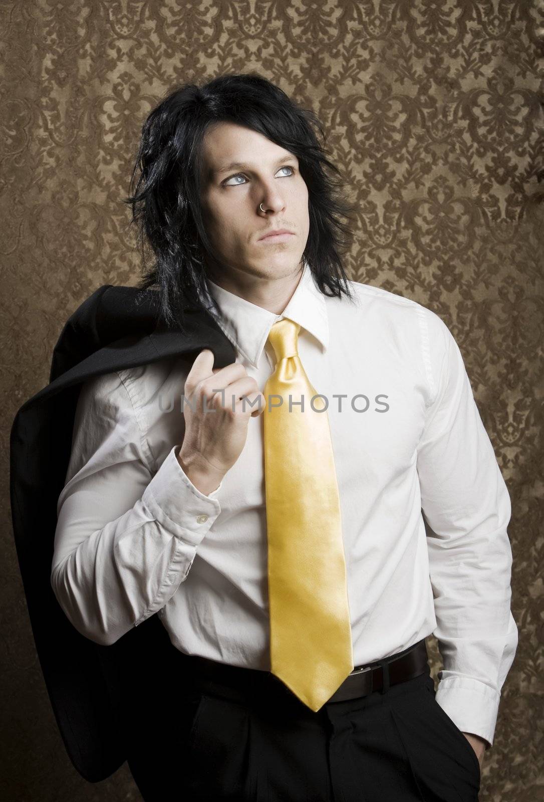 Handsome man seated in a business suit