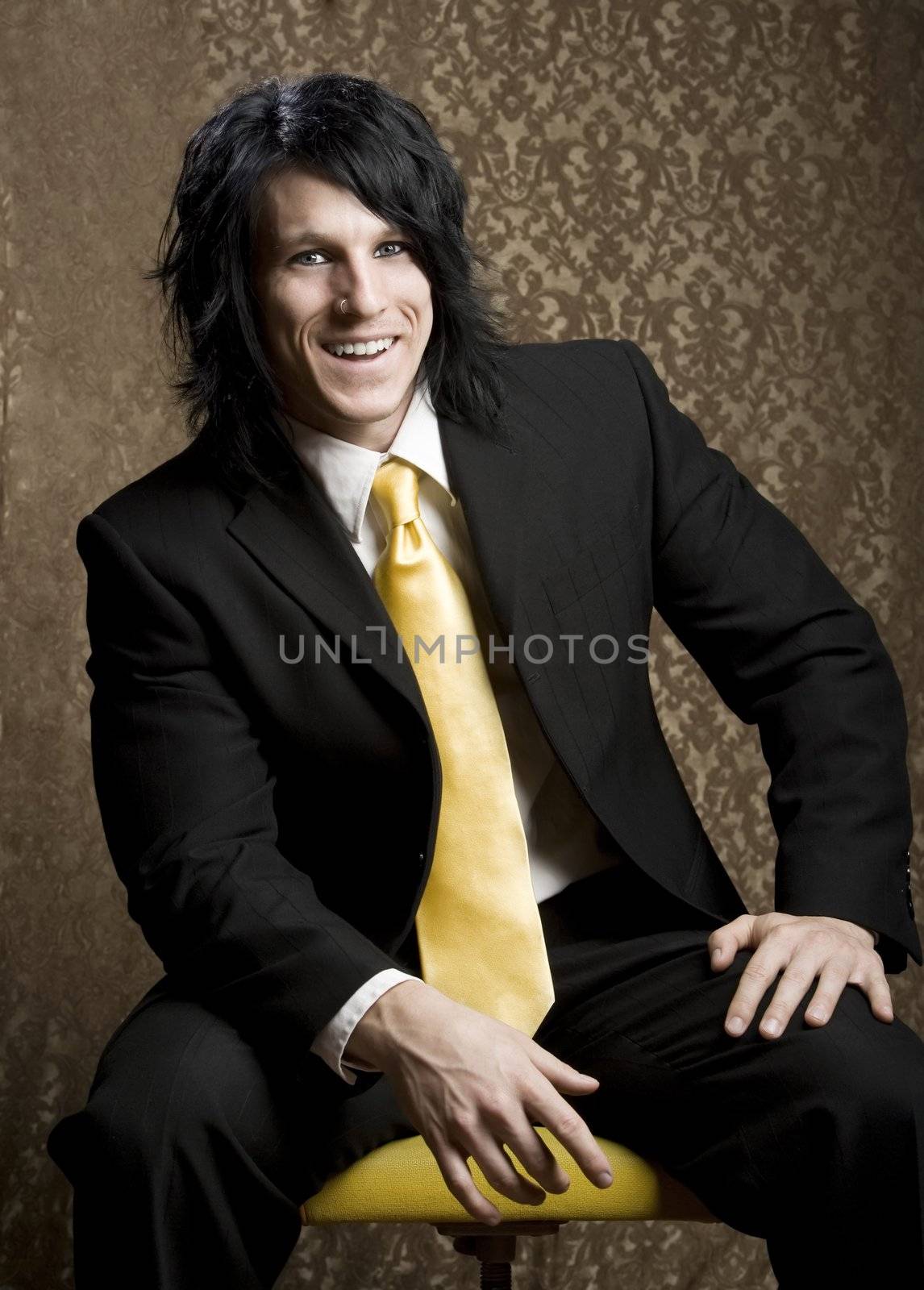 Handsome man seated in a business suit