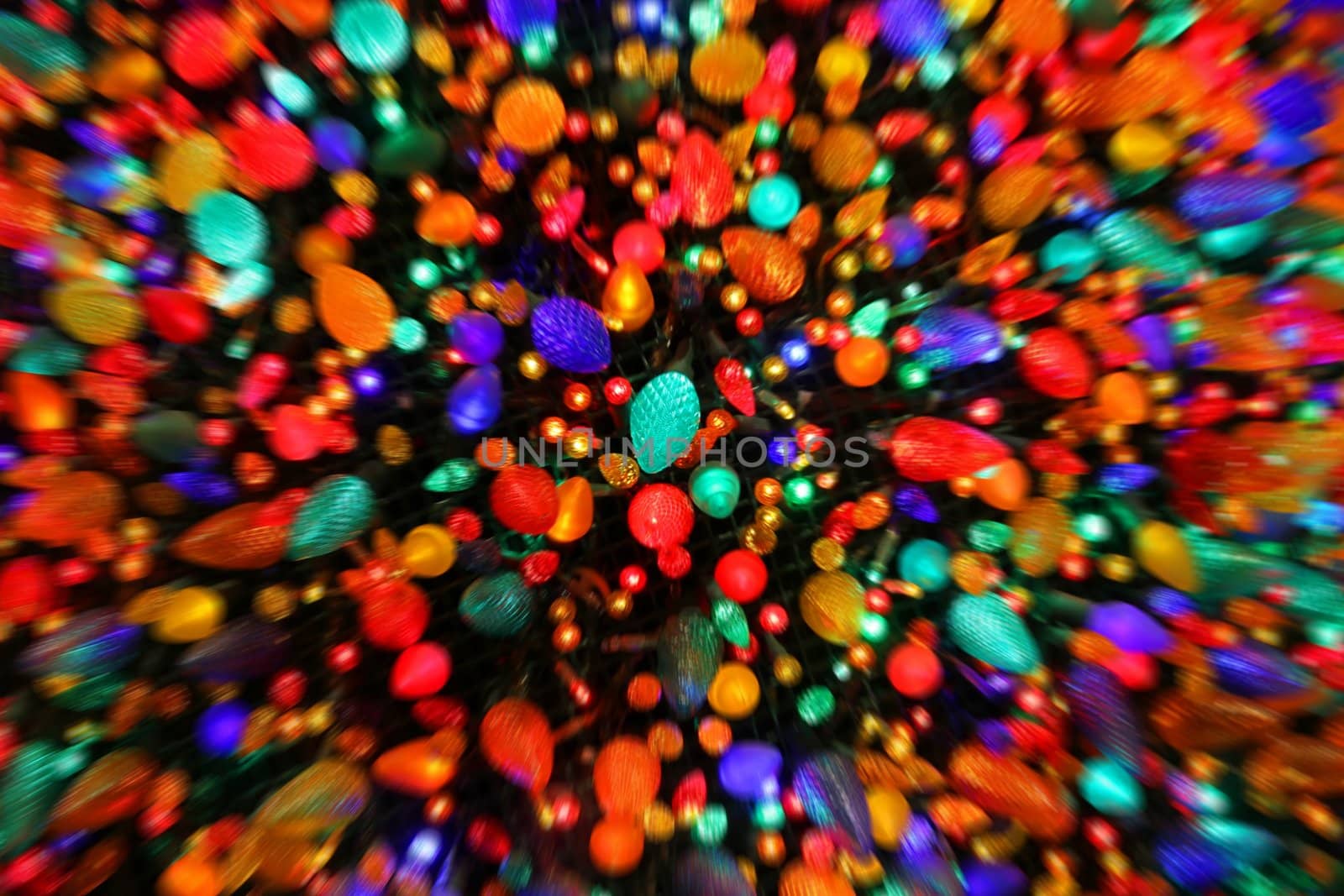 Christmas lights bunched together with a zoom blur.