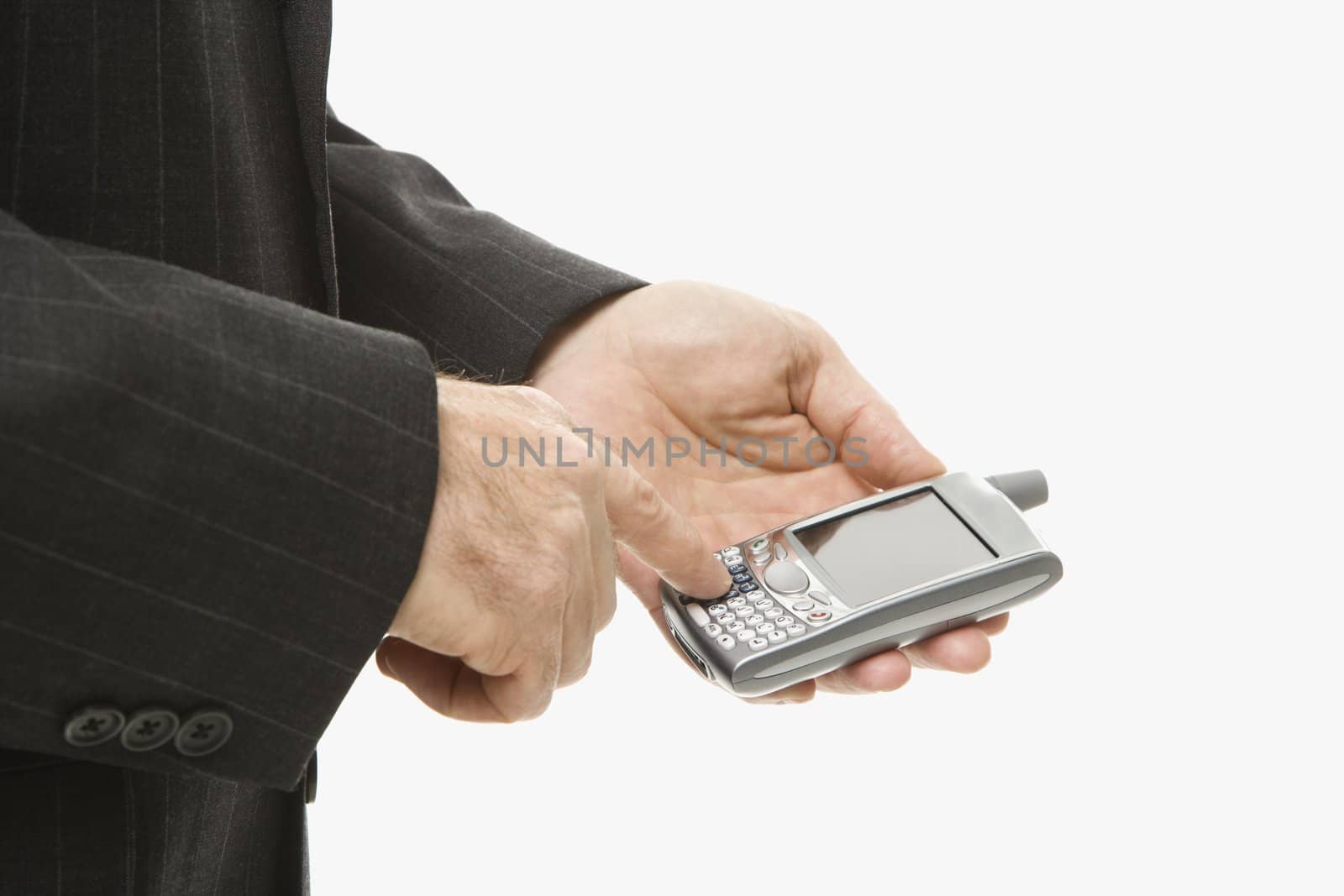 Close-up of Caucasian middle-aged businessman using handheld PDA.