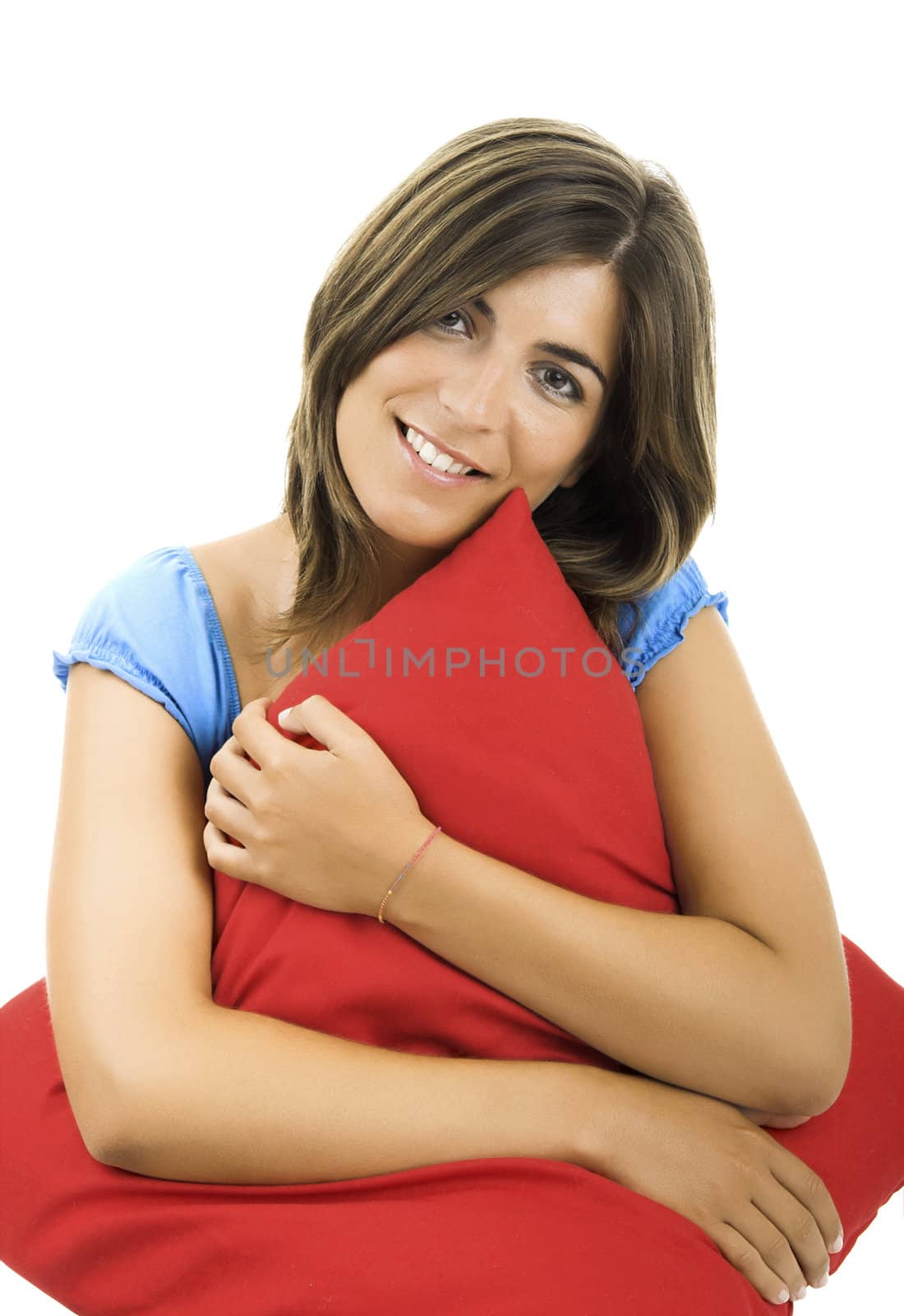 Beautiful woman with a soft cushion in a white background