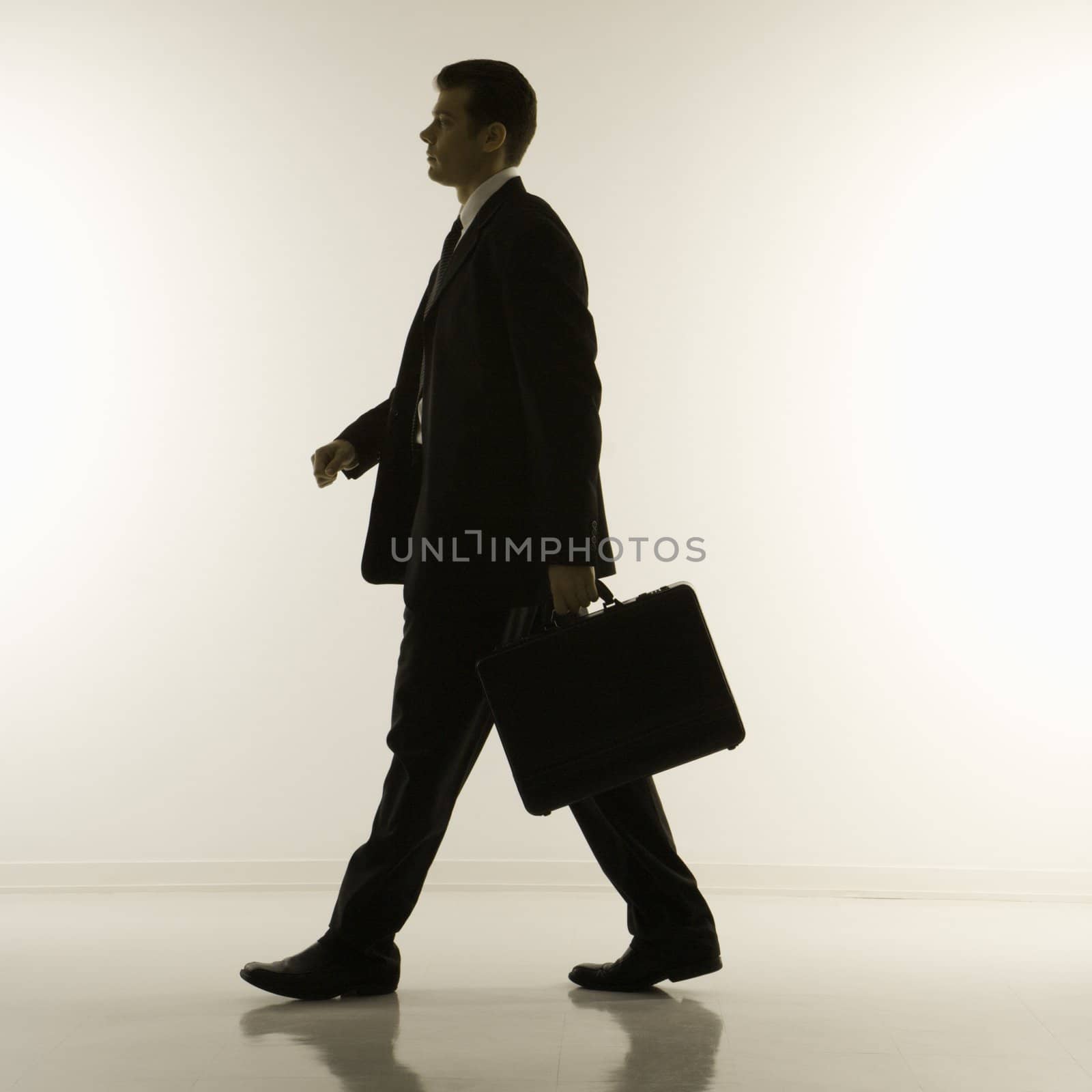 Businessman walking. by iofoto