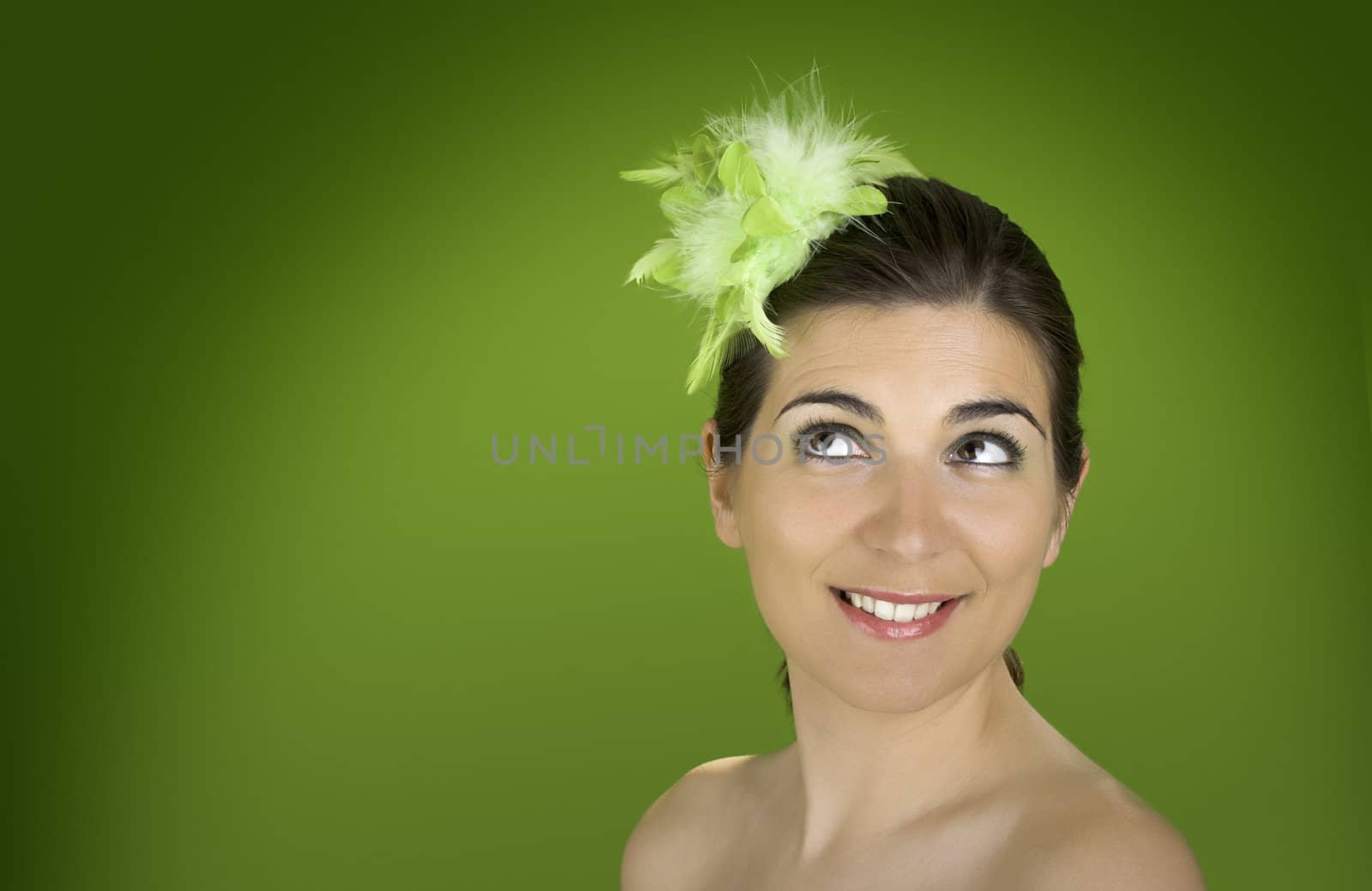Beautiful easter woman portraits on a green background