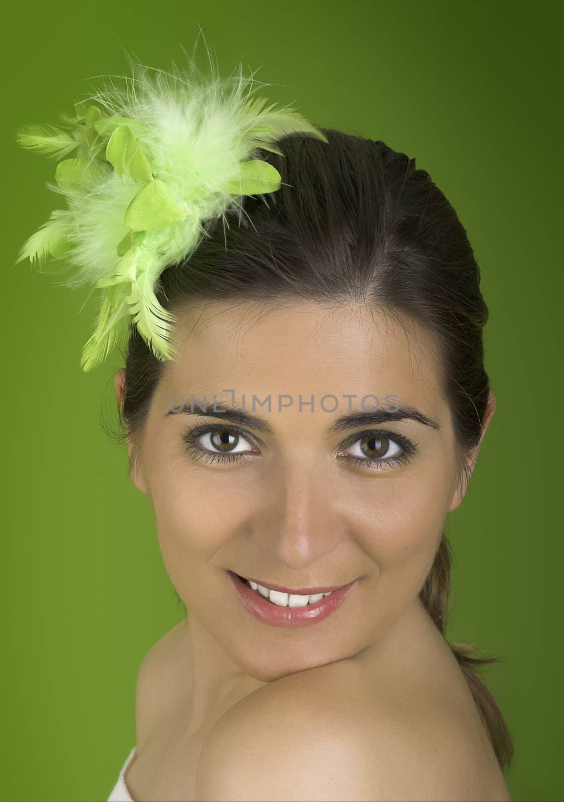 Beautiful easter woman portraits on a green background