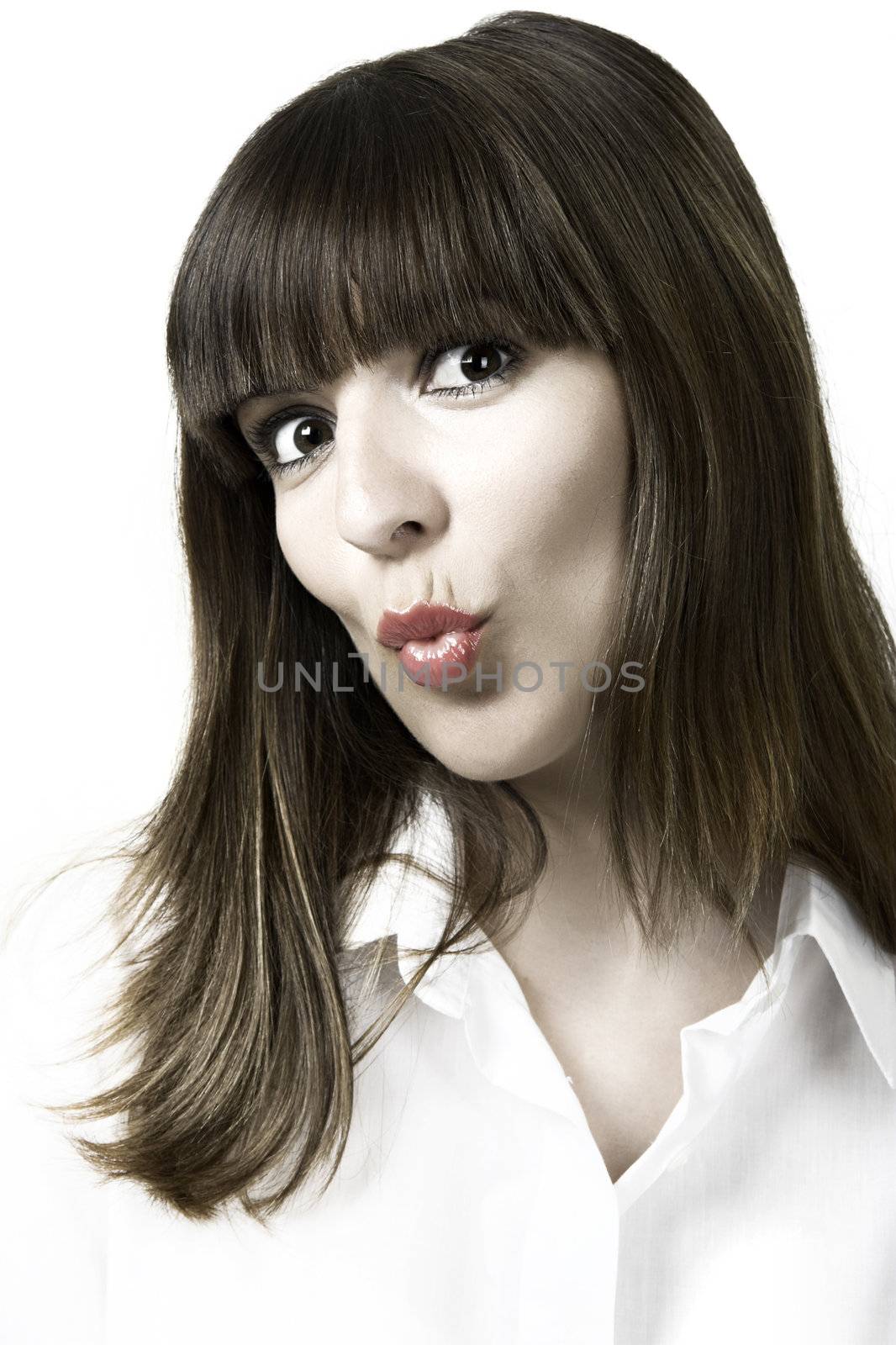 Portrait of a young beautiful woman kissing