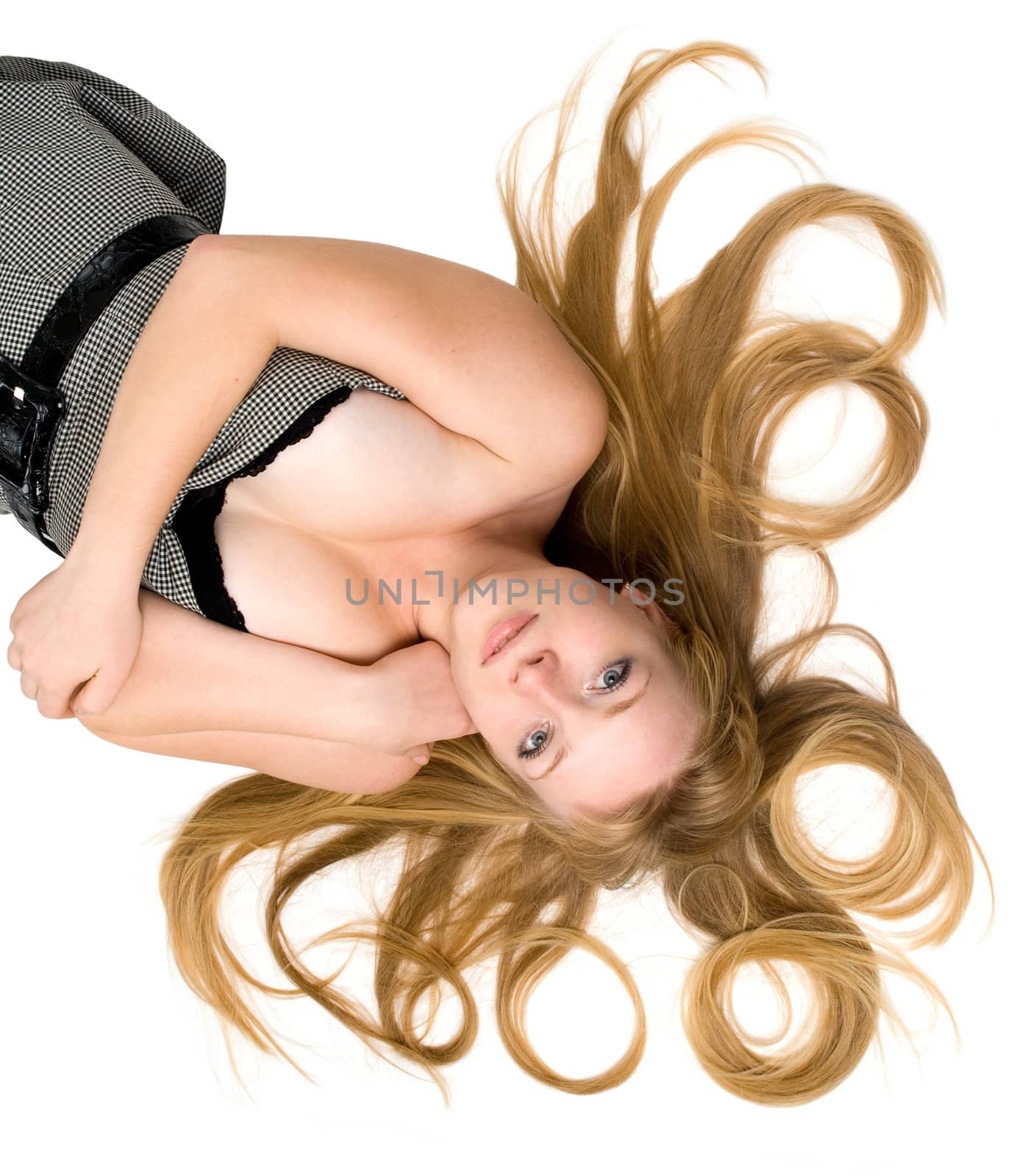 Great hair. Portrait of a sexy woman lying against isolated white background