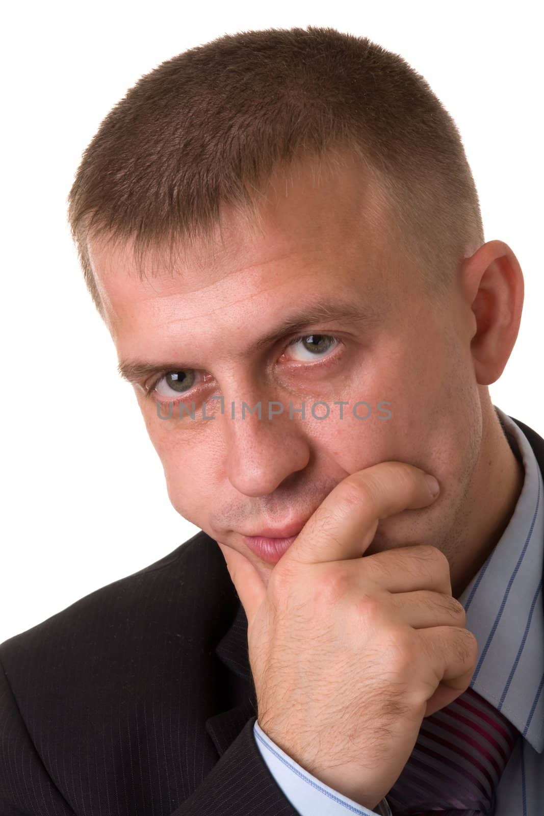 Portrait of the serious businessman isolated on white background