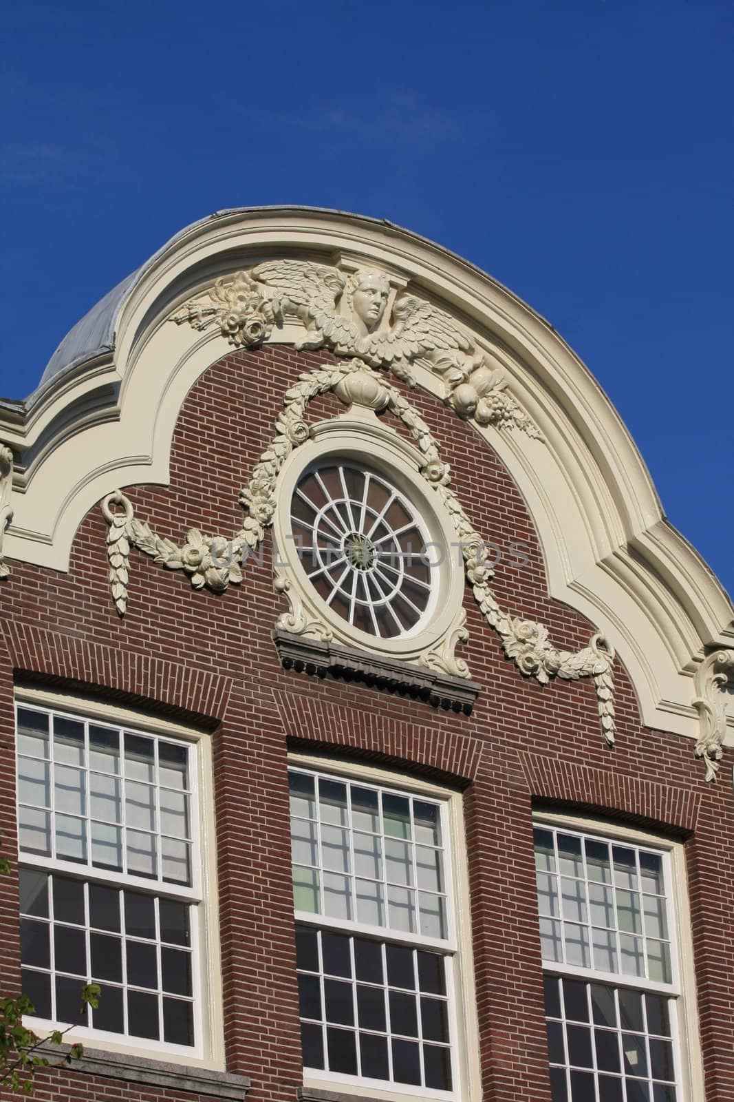 A historic facade with classic ornaments in Haarlem