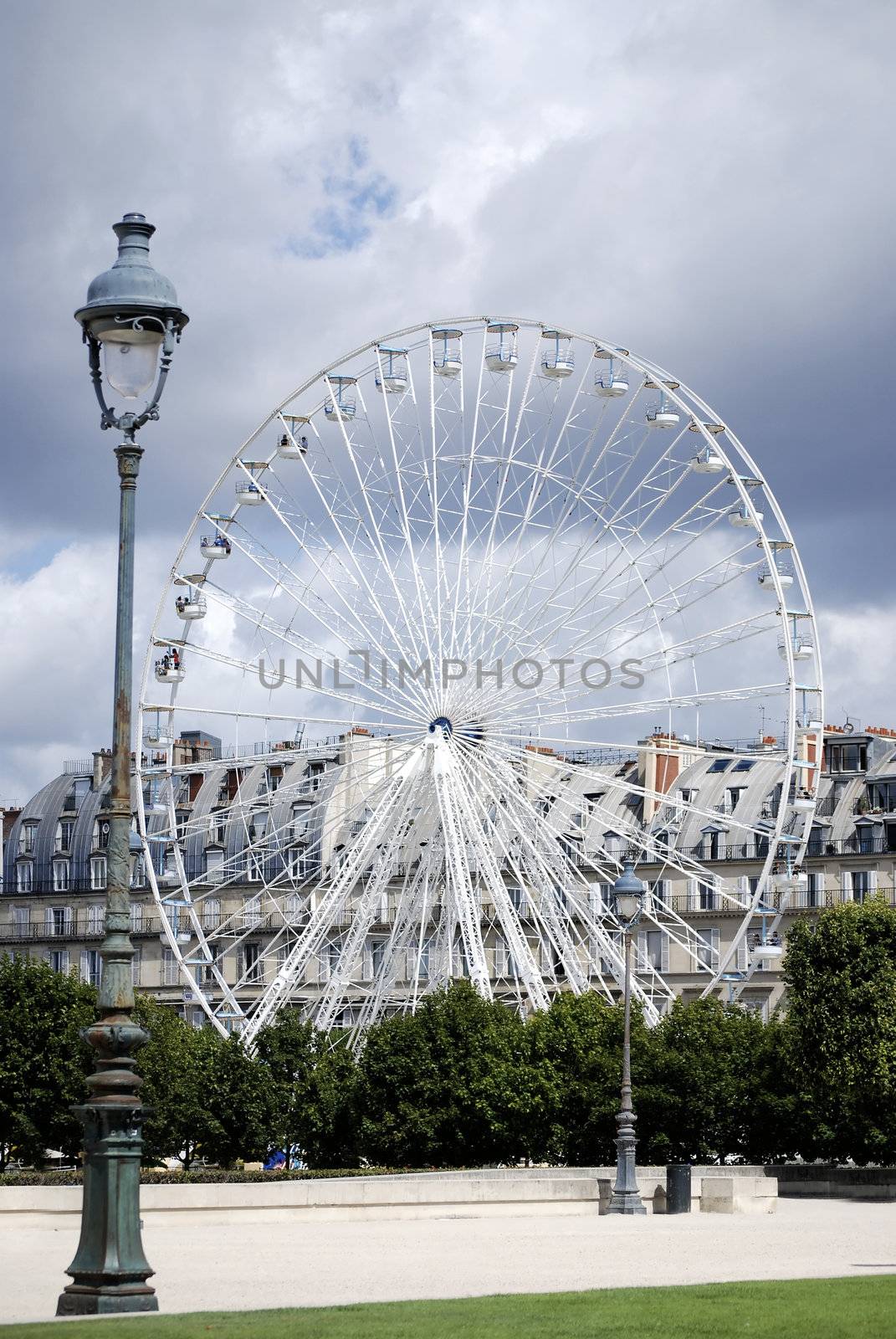 Huge wheel in the city centre of Paris, France