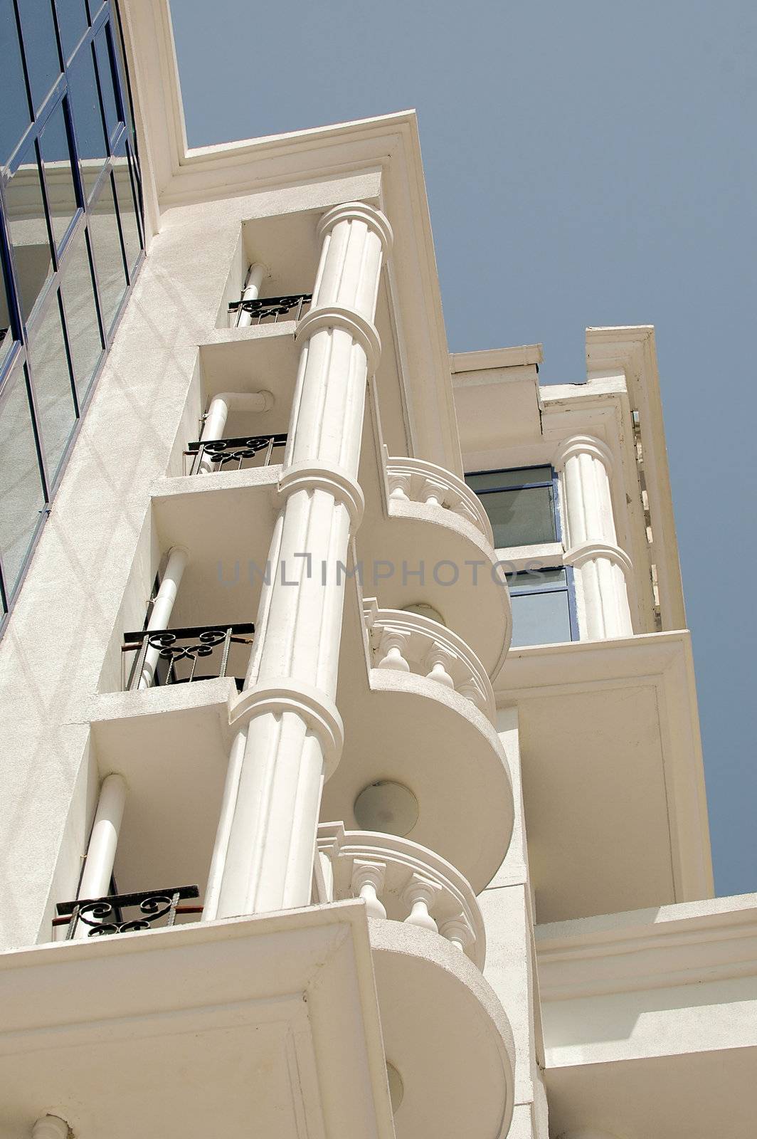 Hotel balconies and clear blue sky