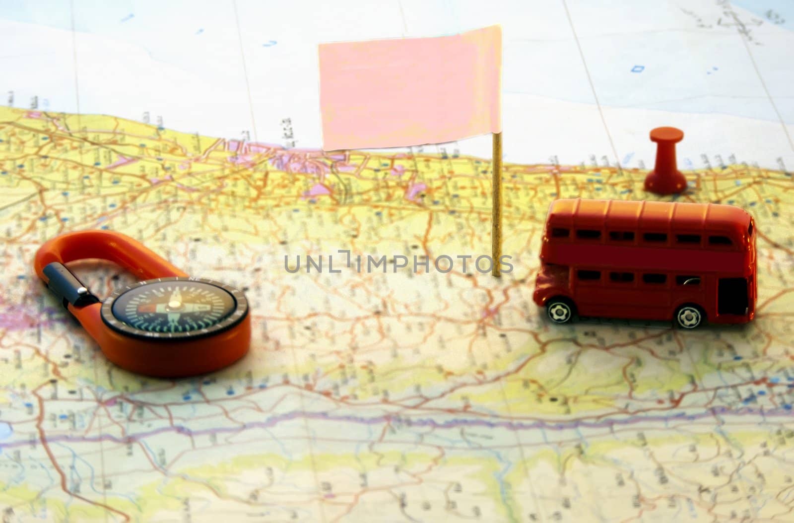   A set of car over a map symbolyzing travel