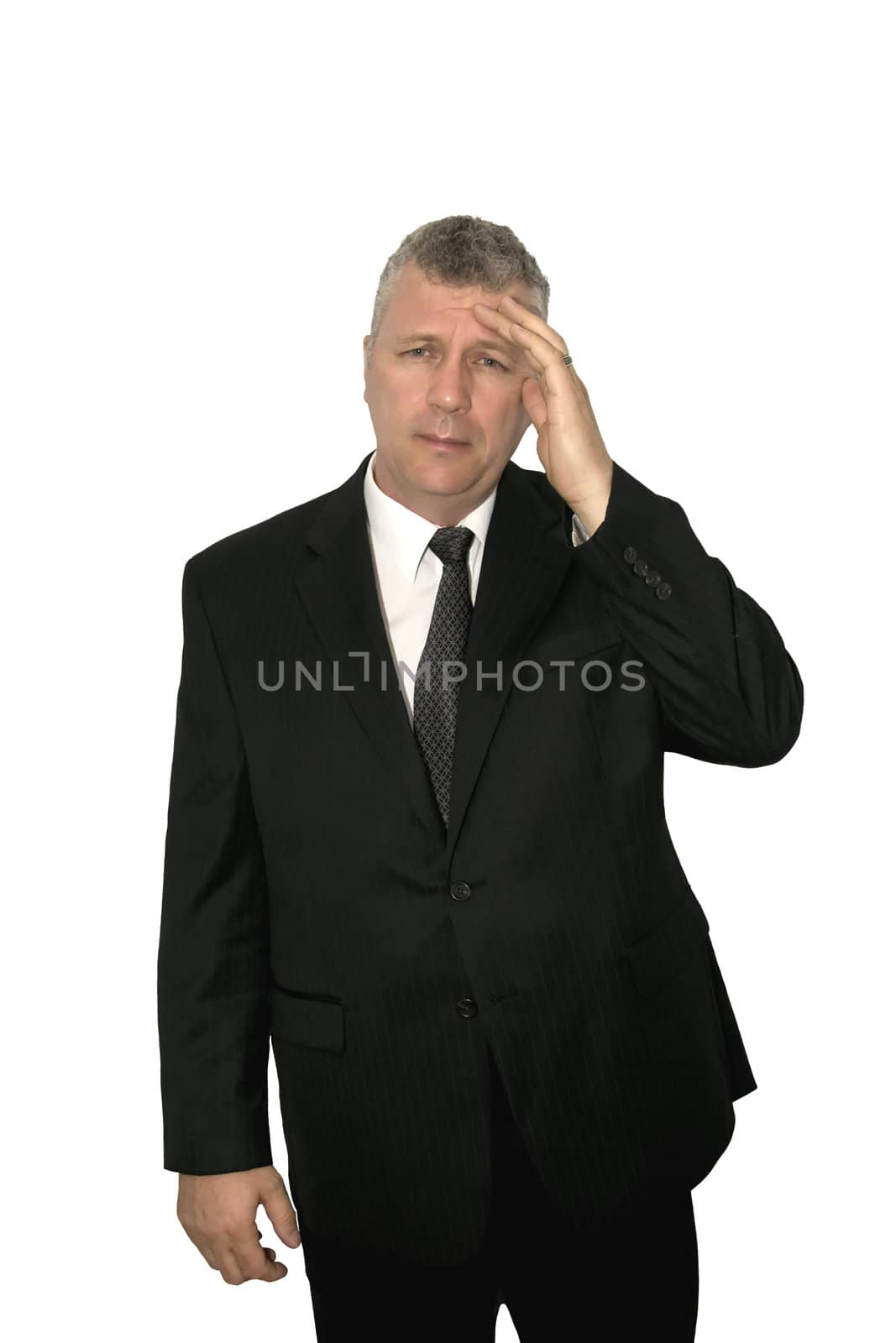 Middle-aged businessman suffering from a headache.