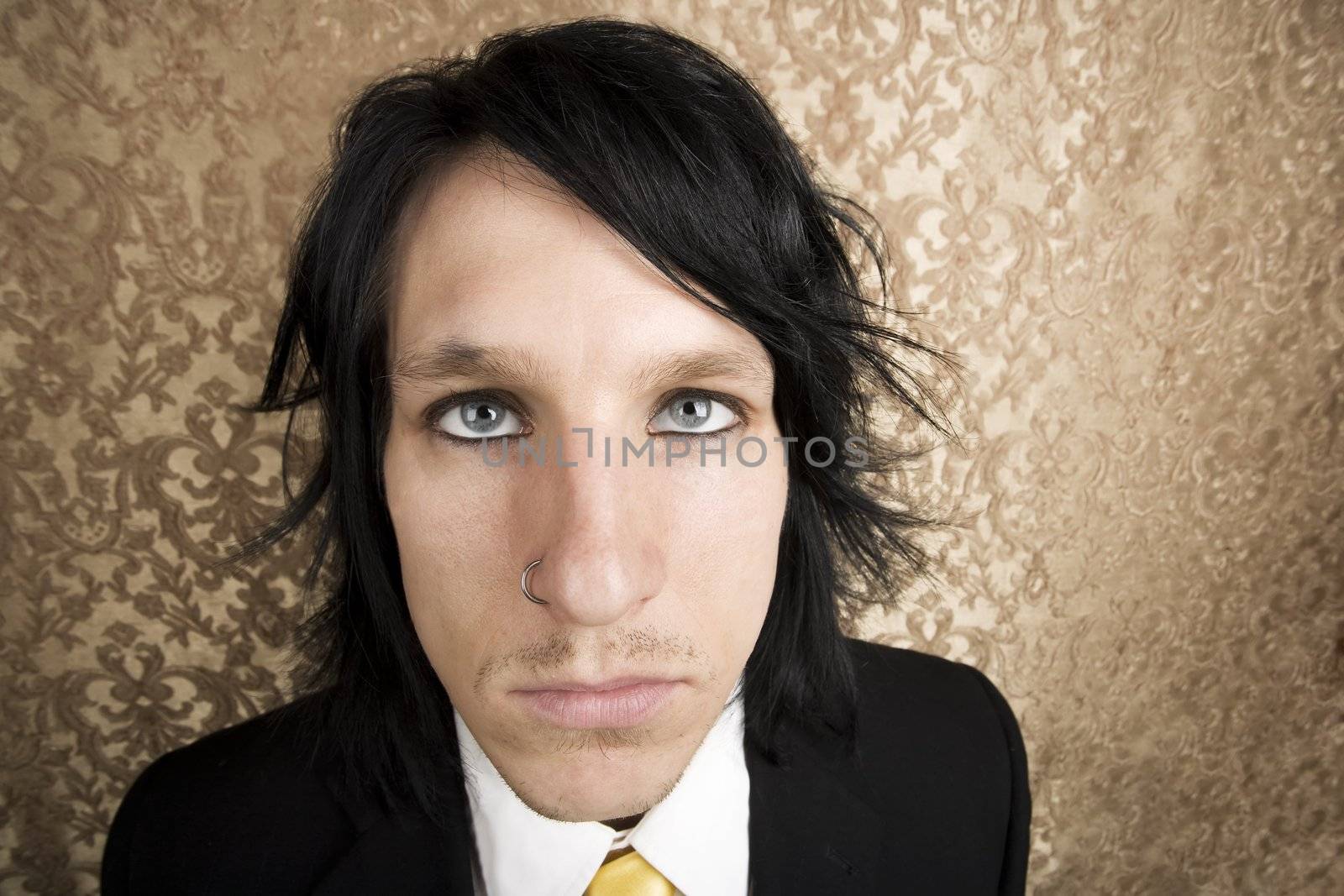 Wide Angle Closeup of Rock and Roll Businessman Looking Up