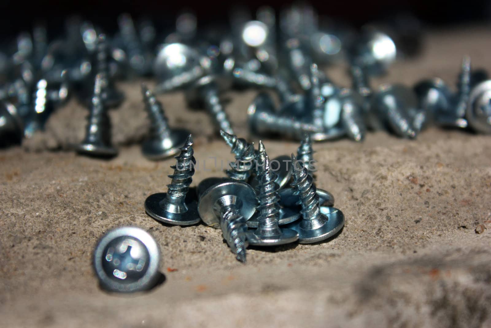 fasteners, screws for work, a lot of screws, screws, metal screws, screws shiny, new hardware