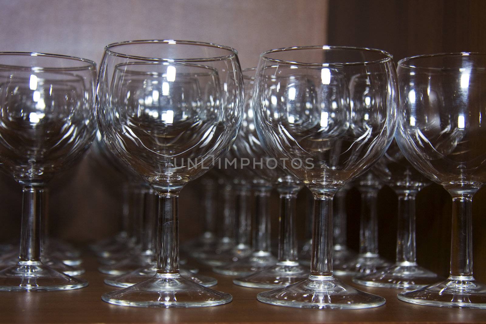 A lot of glass goblets on the table