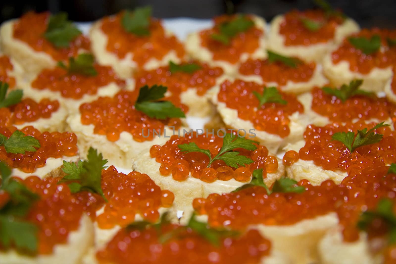 Red caviar on canape by grigorenko