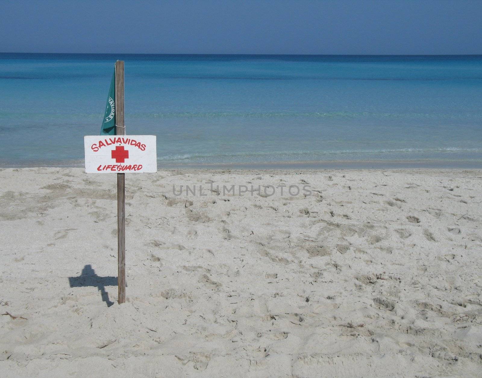 lifeguard sign on the beach