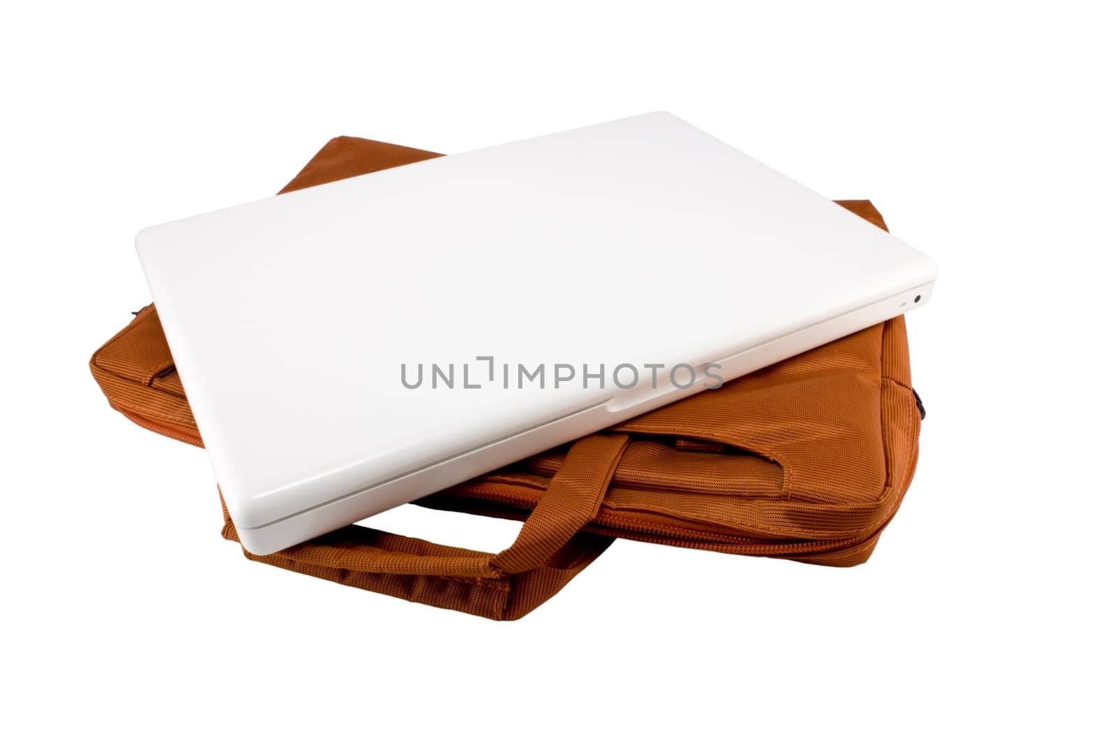 Orange bag and white laptop by magraphics