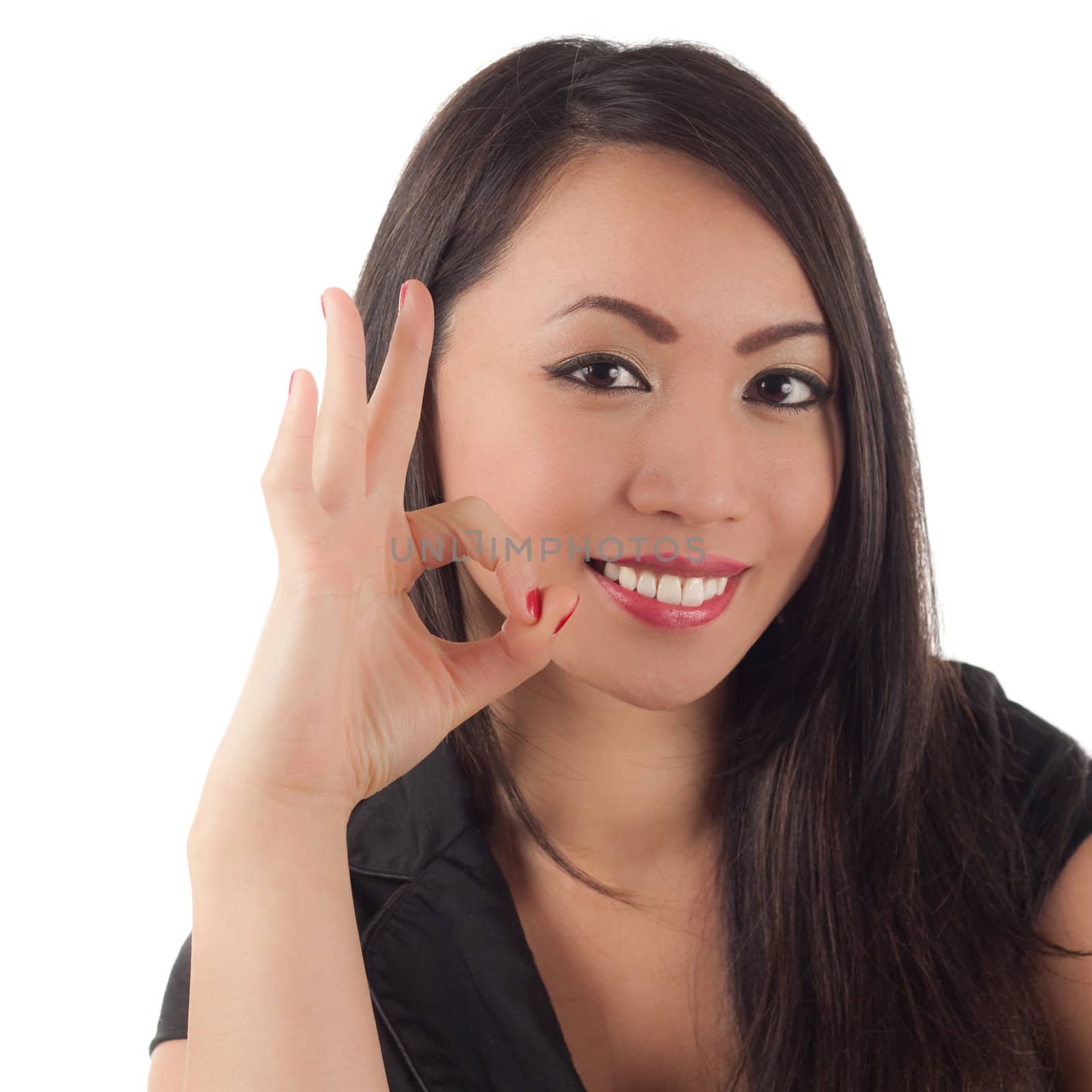 Cute young asian woman showing okay sign by svanblar