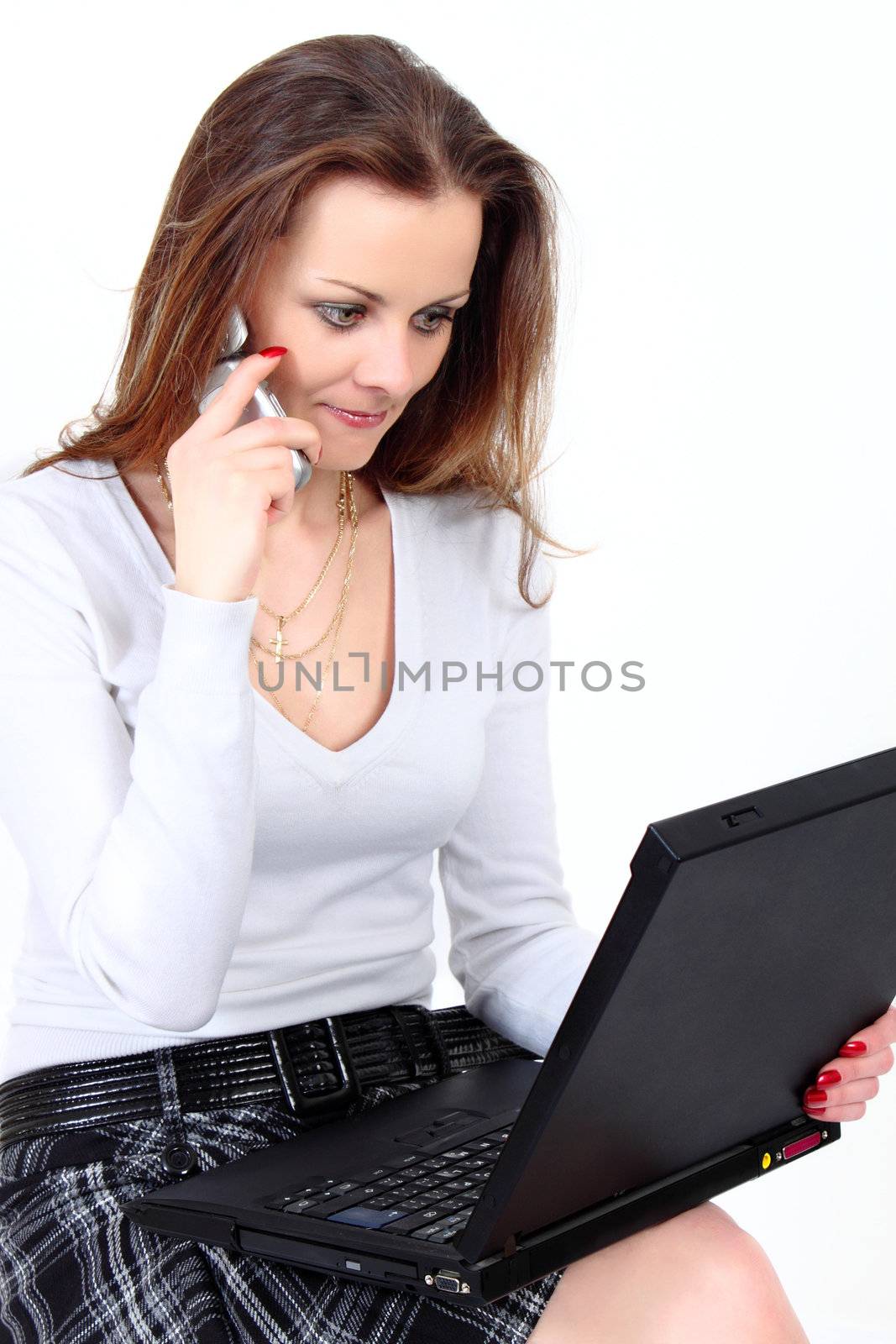 Sales manager with notebook speaking by mobile phone on white background