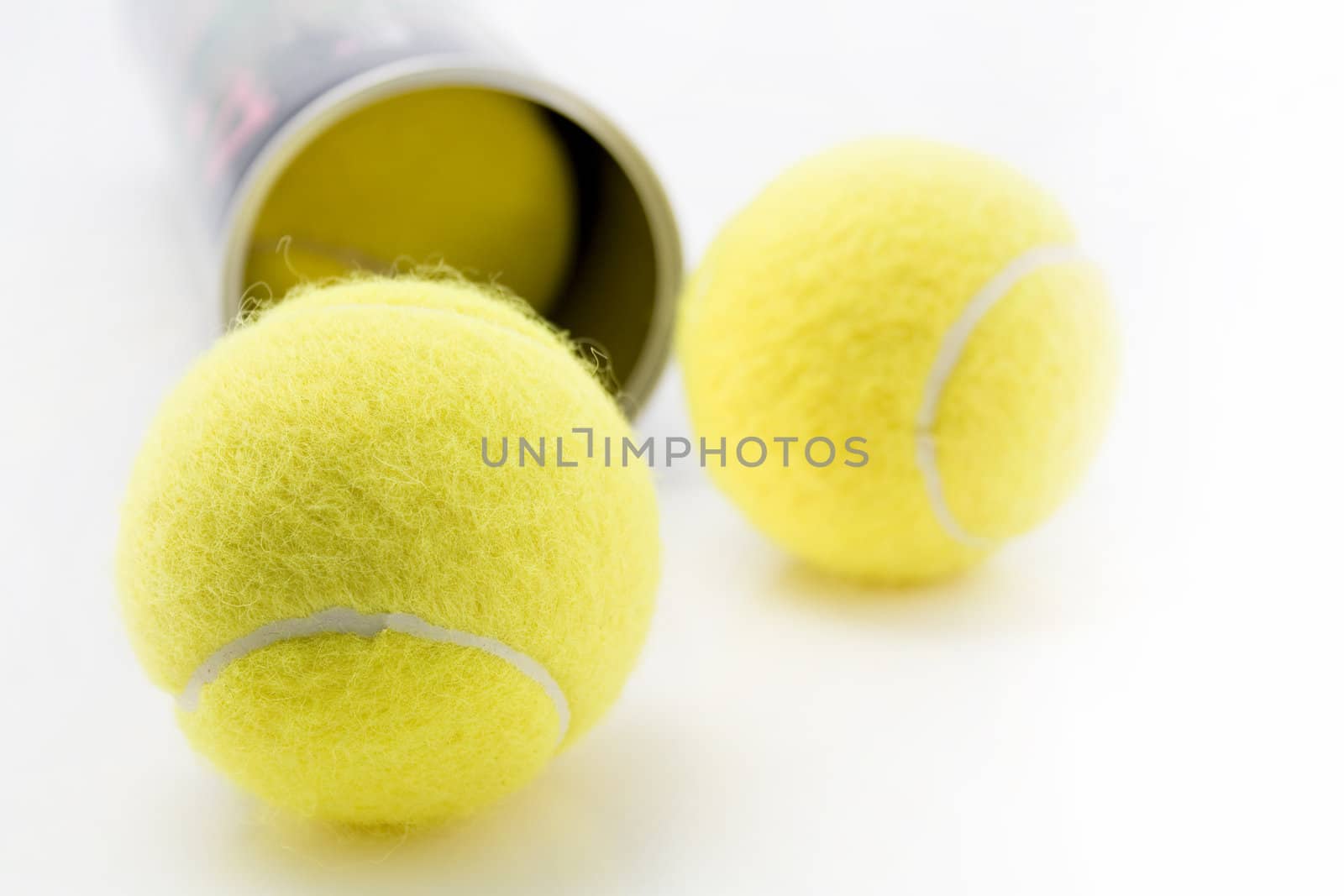 Close-up image of tennis balls on white background