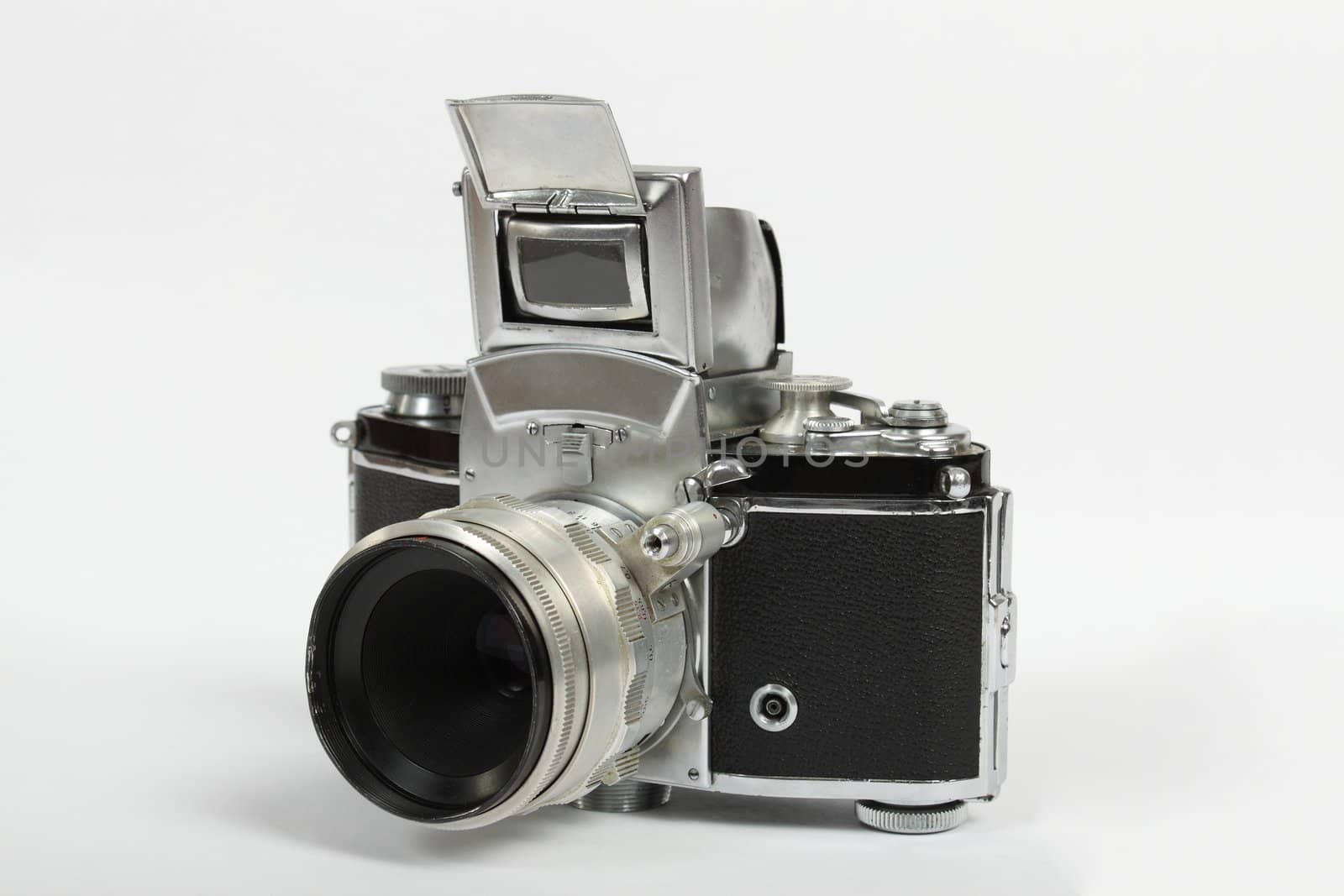 retro old vintage analog photo camera on white by artush