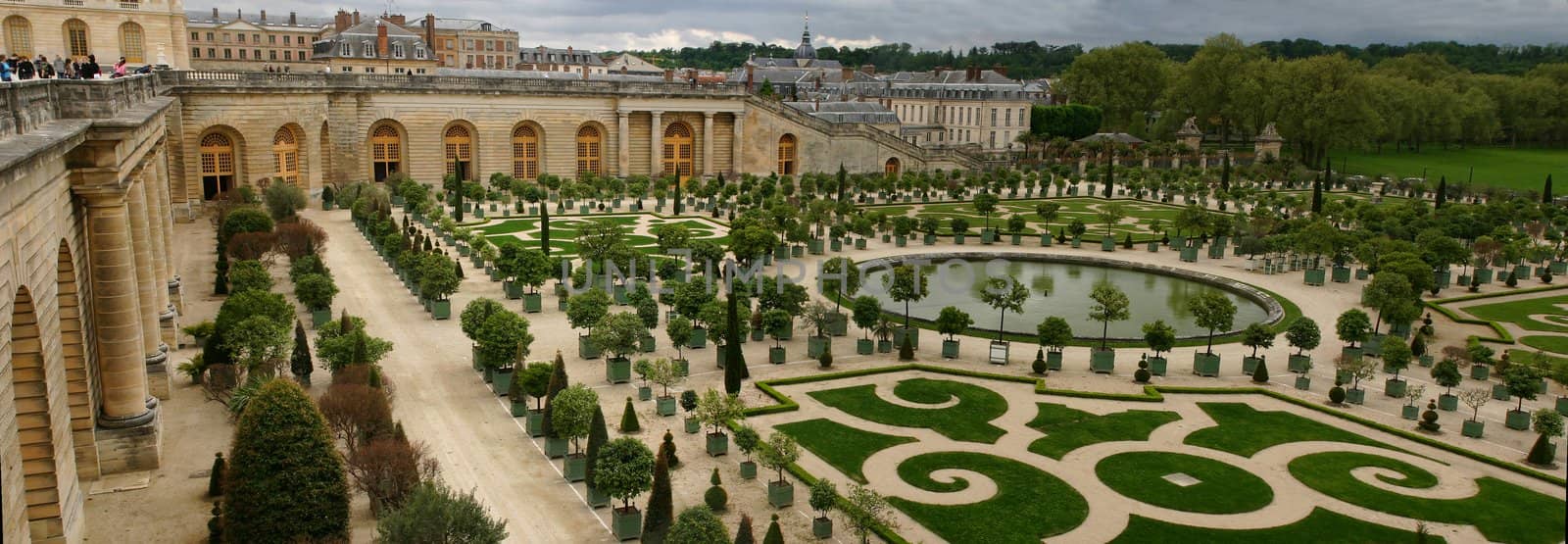 wide panorama of famous versailles orange garden in france