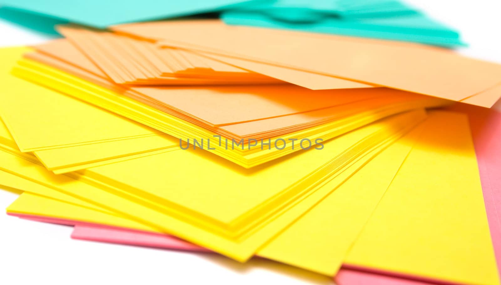 Pile of a pure paper for notes on a white background. Isolation, shallow DOF