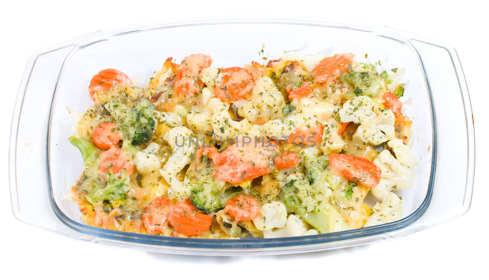 fish with vegetables on glass plate, isolated over white