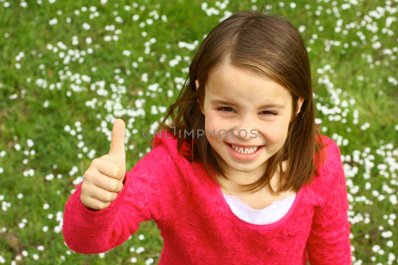 Cute girl with thumb up