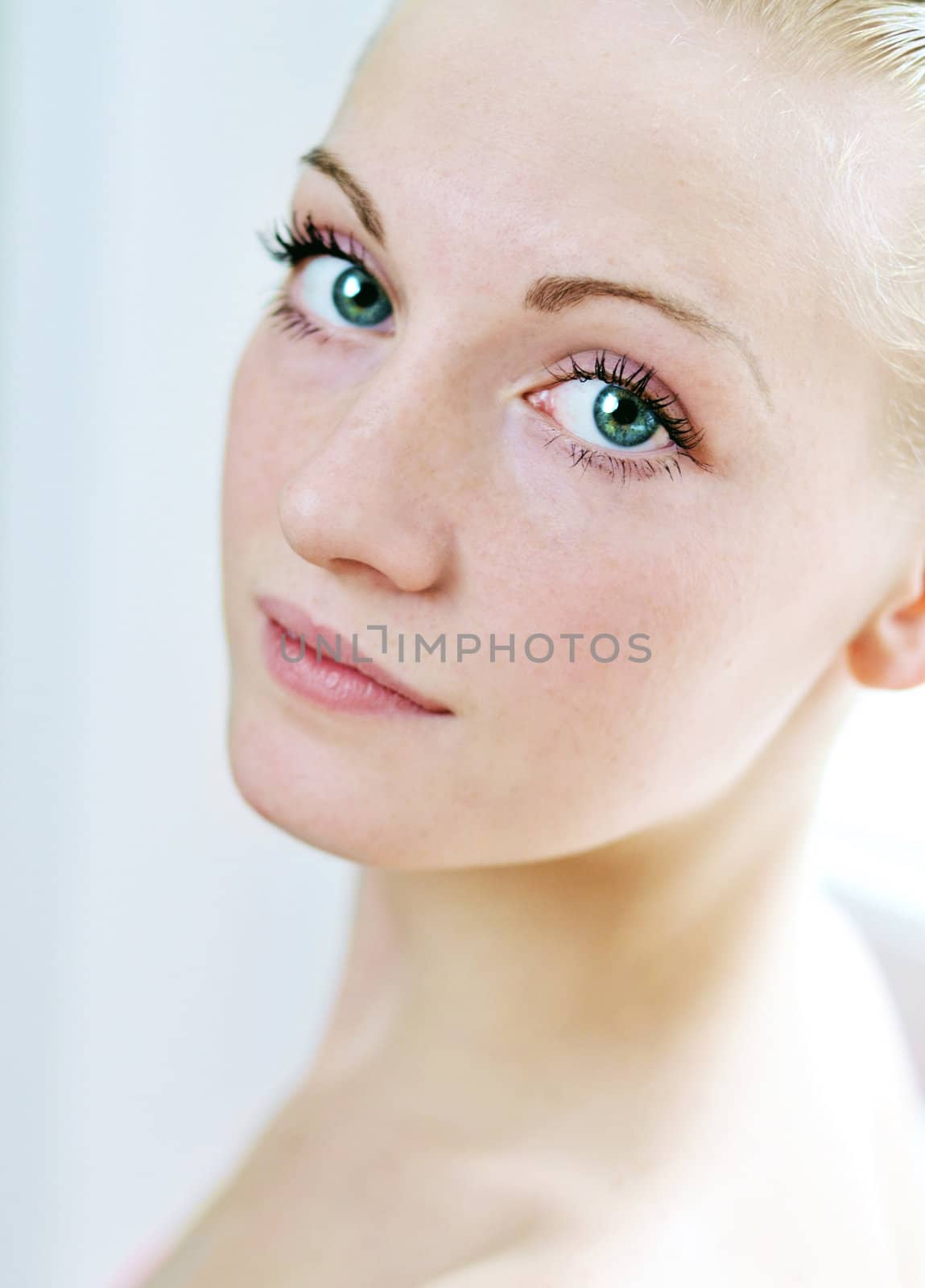 clear portrait of elegant slim girl with clean skin

