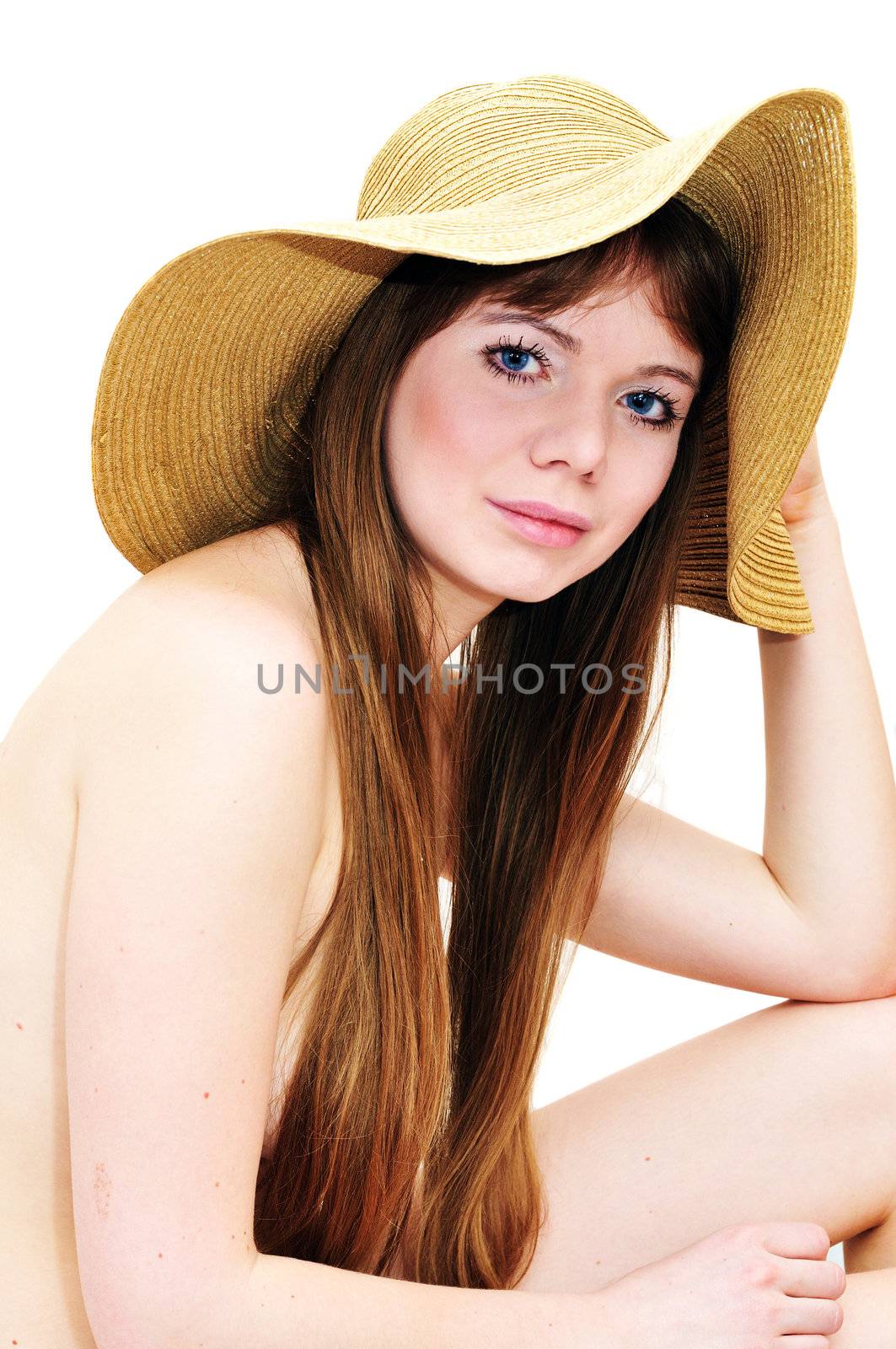 girl wearing only hat over the white