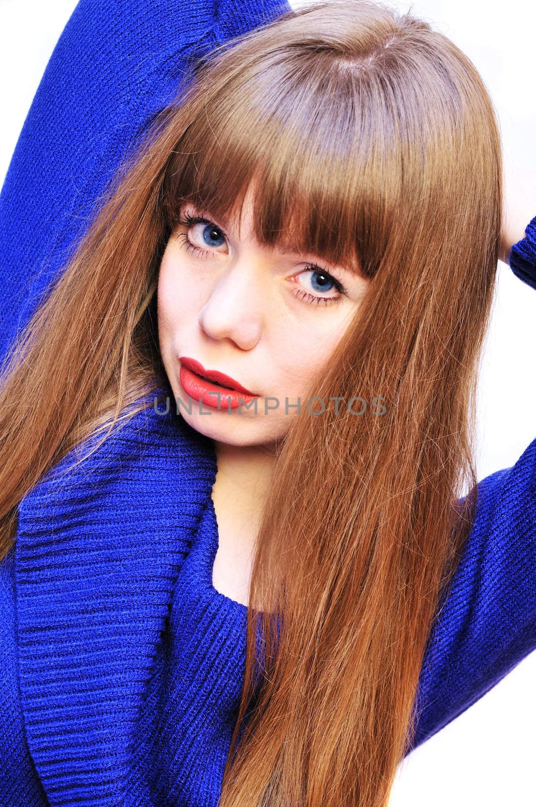 blue-eyed lovely girl wearing blue sweater