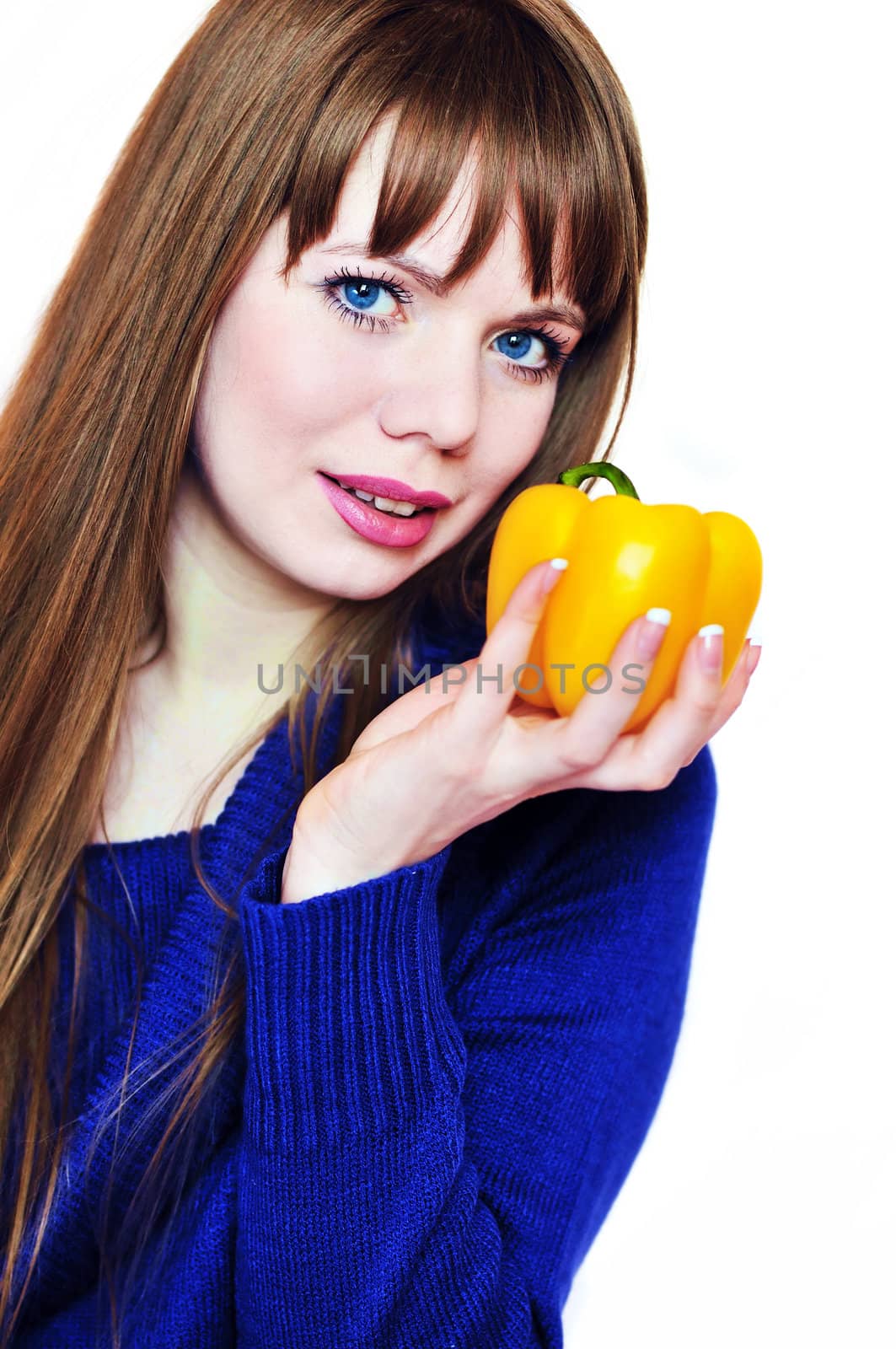 beautiful young woman with pepper  over the white