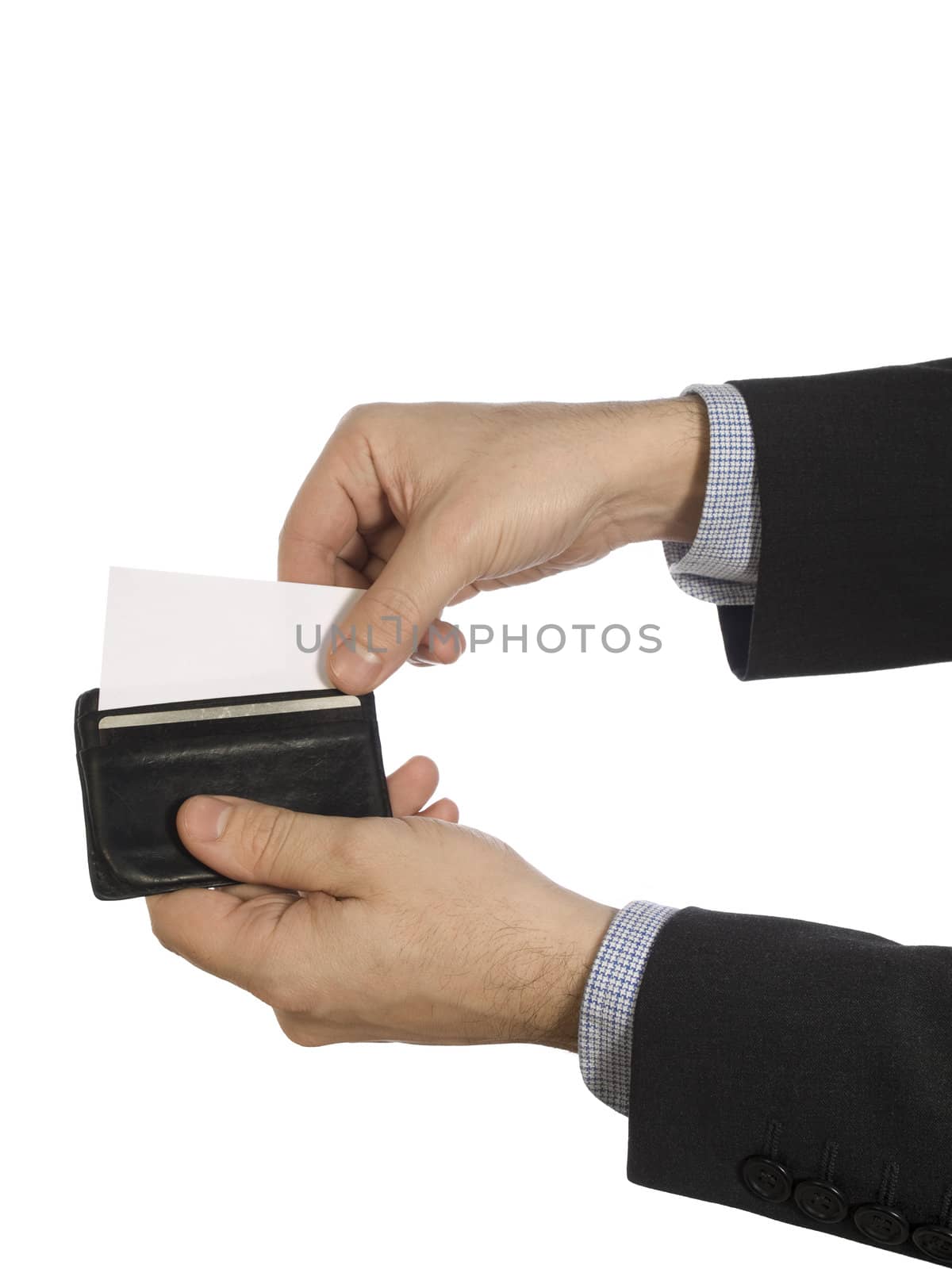 Two hands pull out a white card from a black leather wallet.