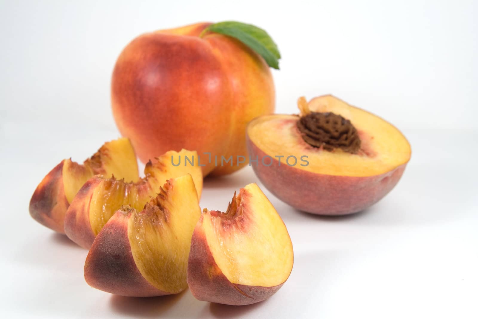 Nectarine and half of peach by serpl