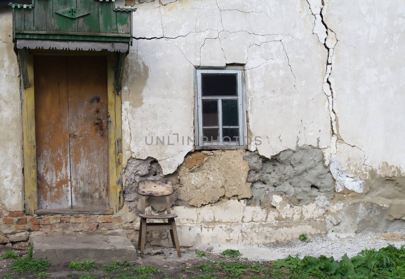 Wall of abandoned house in village