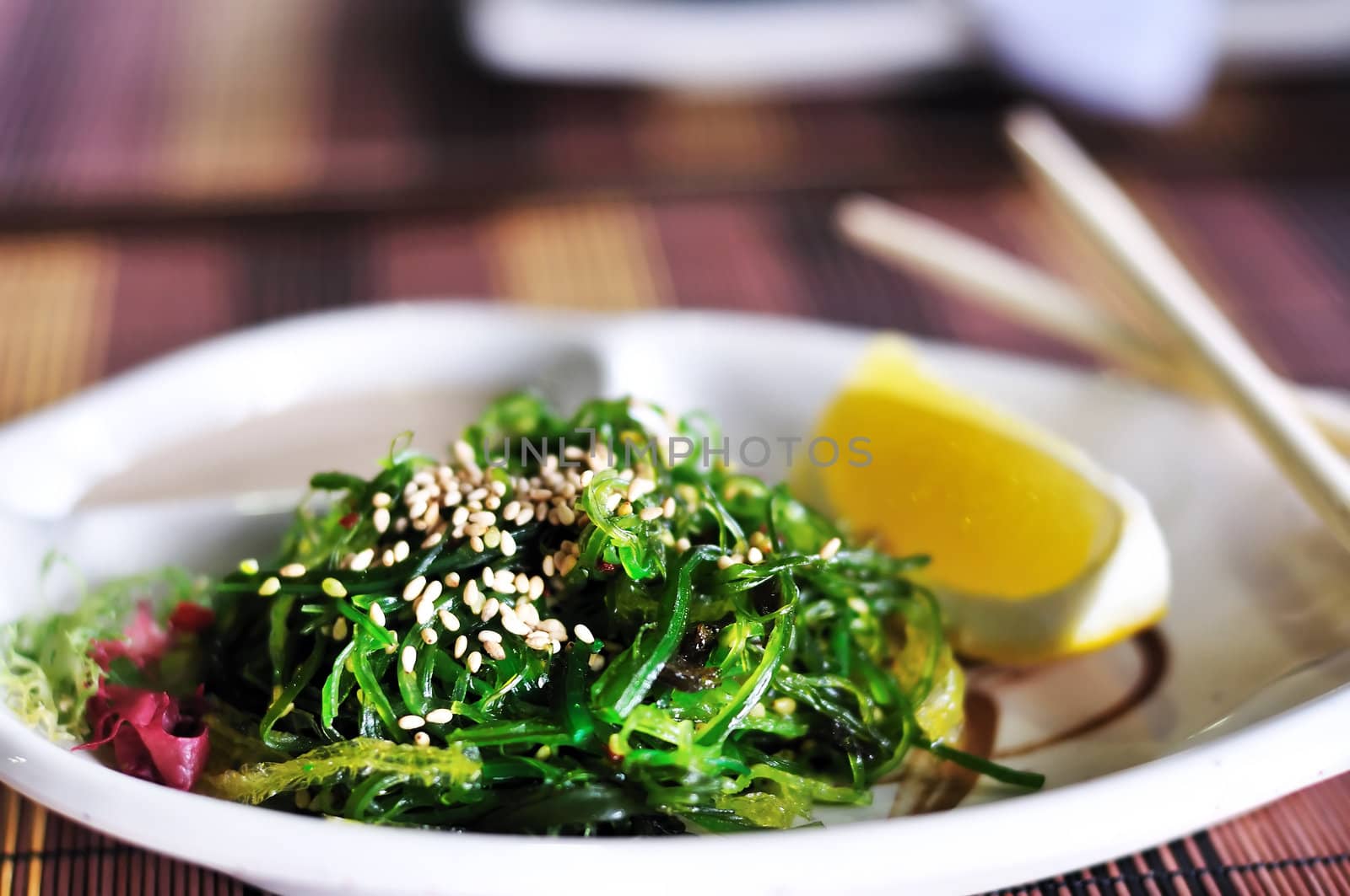 Chuka- japanese salad with  nuts sauce, lemon and sesame 
