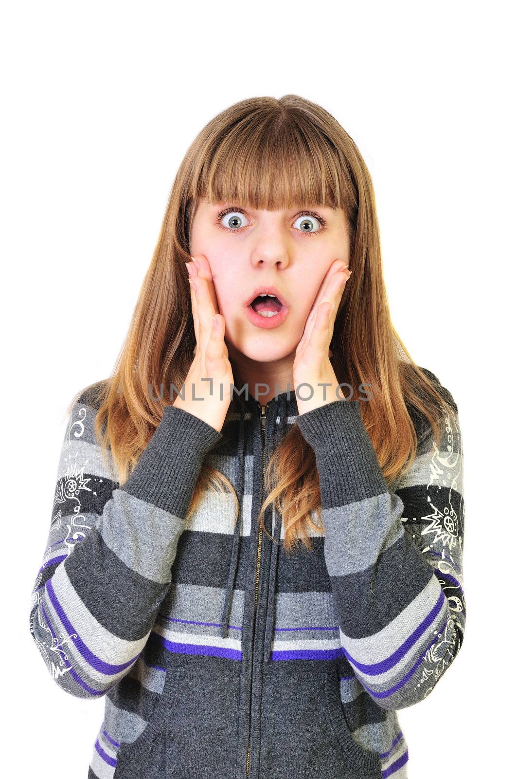 shocked and surprised teen girl over the white