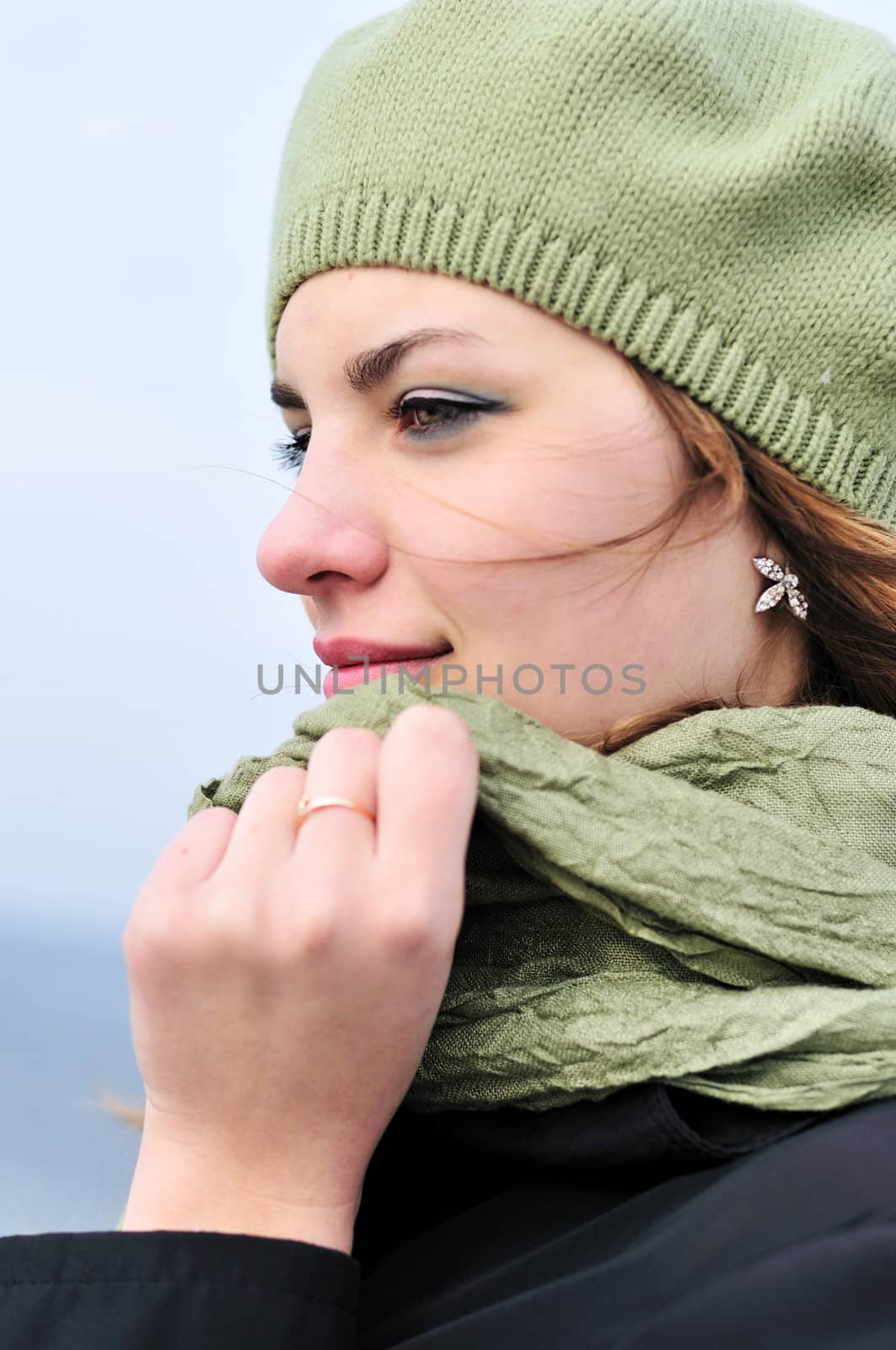 portrait of lovely girl wearing green beret