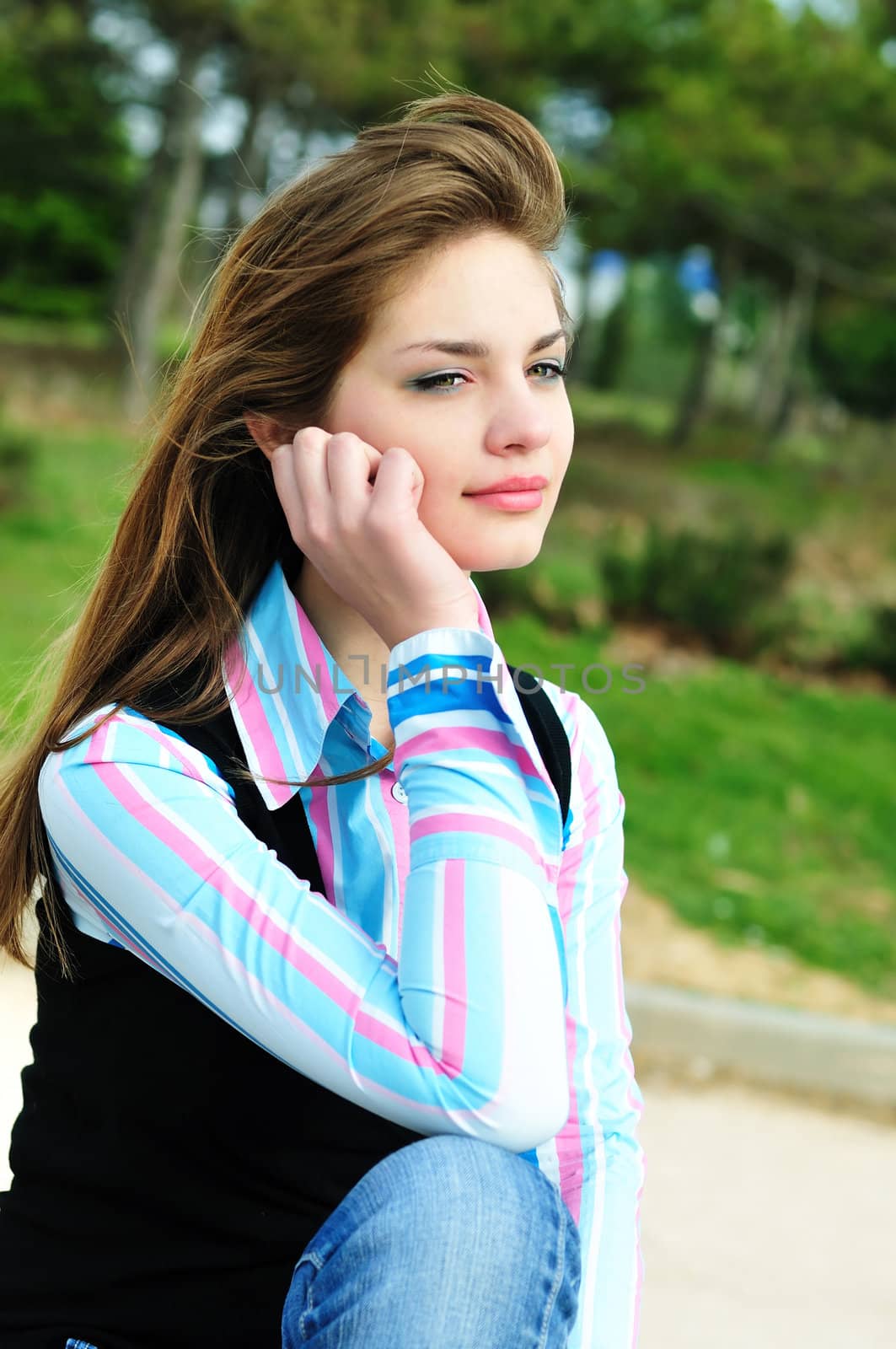 pensive teen girl in the spring time